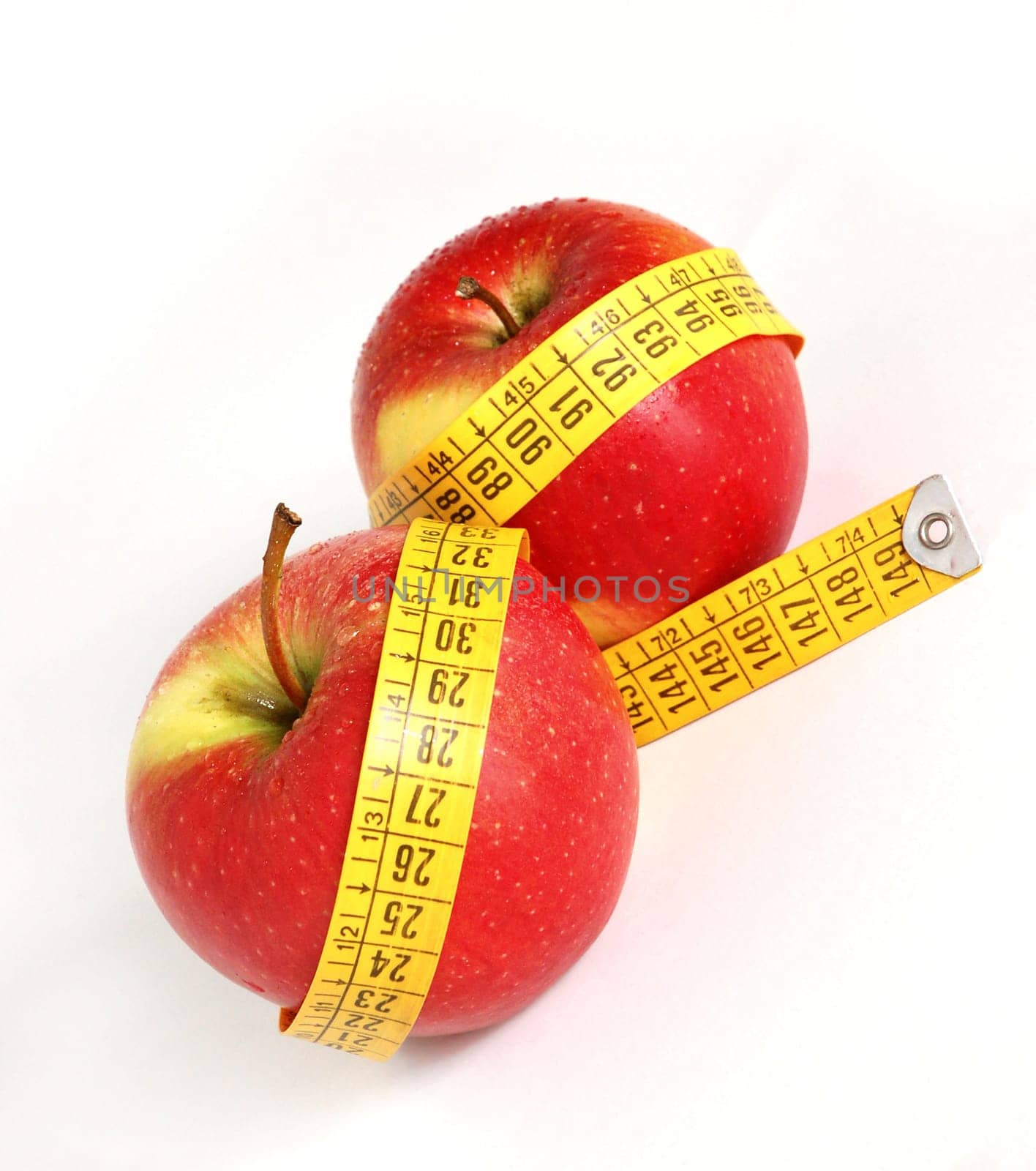 Red apples and tape as a concept of healthy lifestyle
