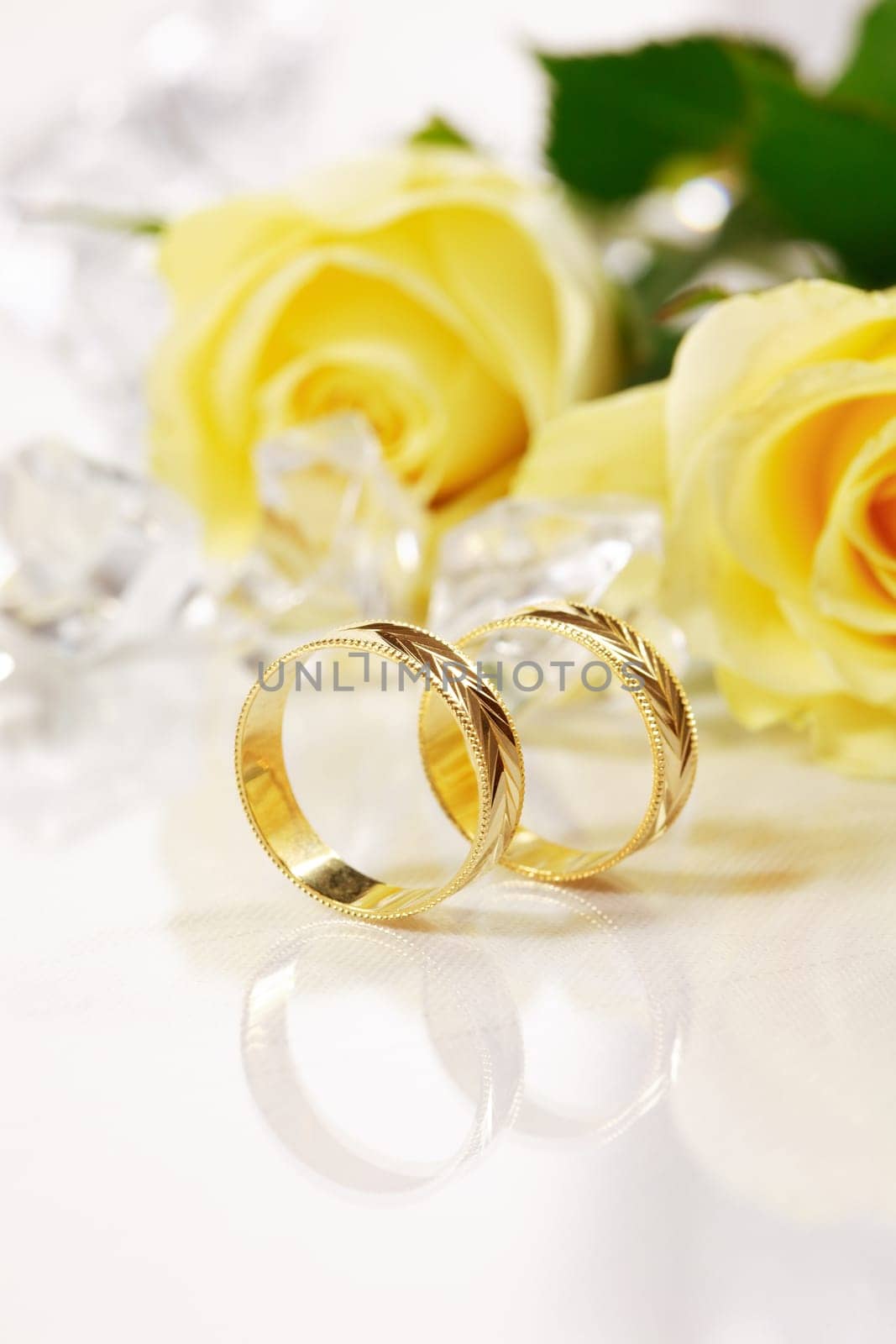 Wedding still life with beautiful golden rings