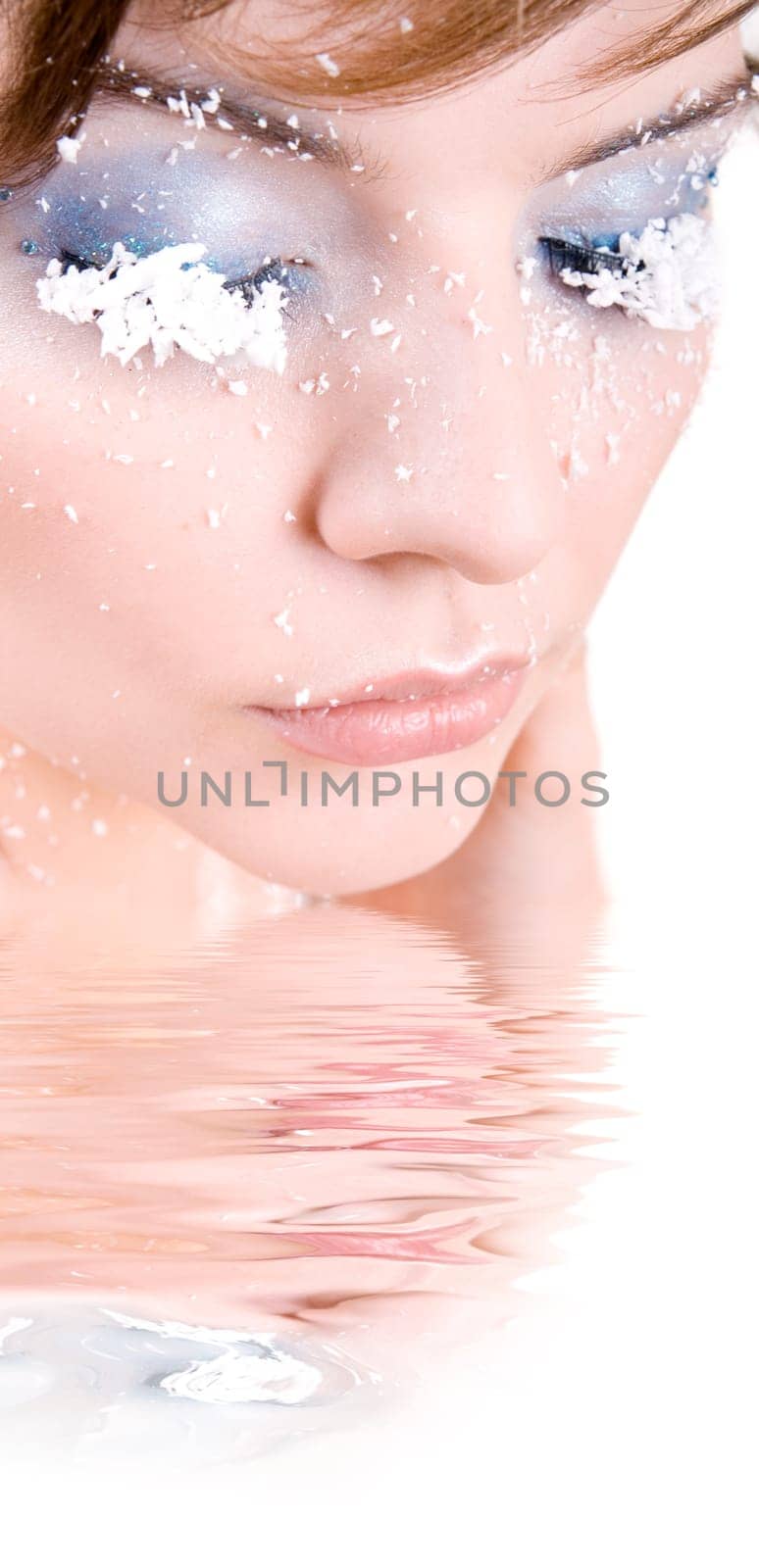 snow girl standing in the icy water