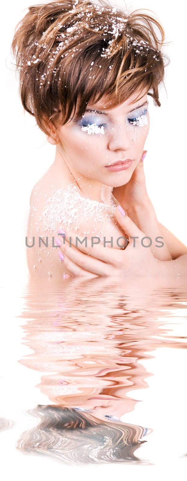 snow girl standing in the icy water