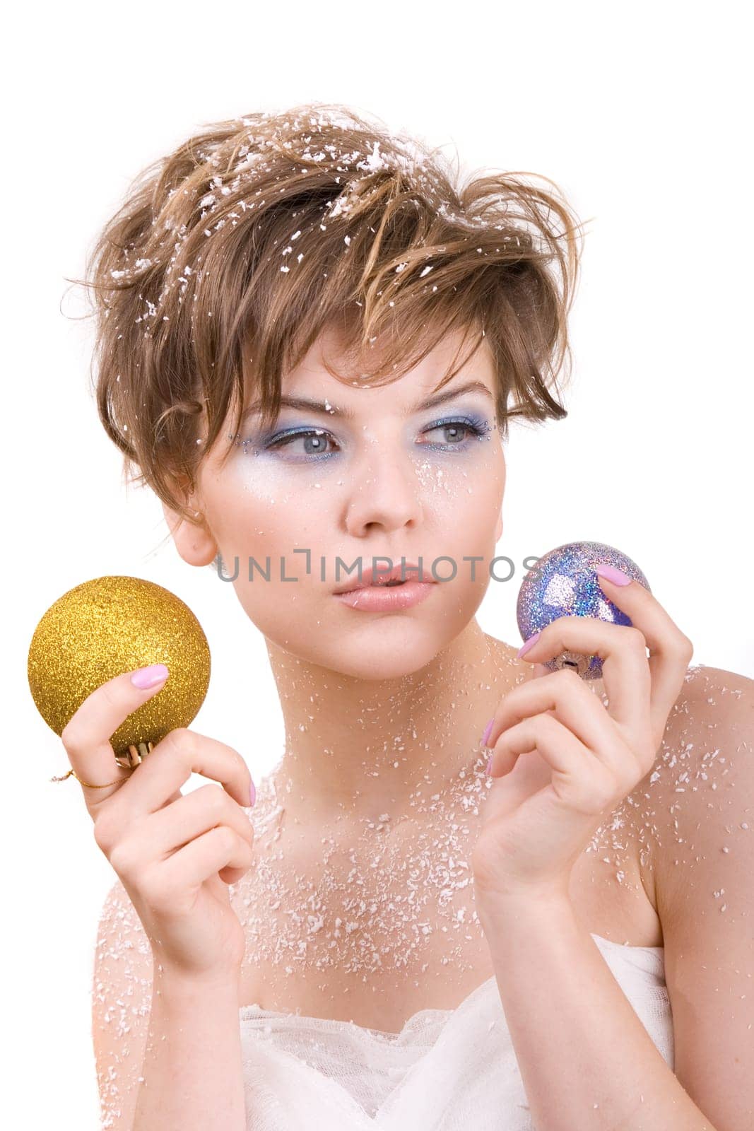 snow girl holding a christmas toy in her hand