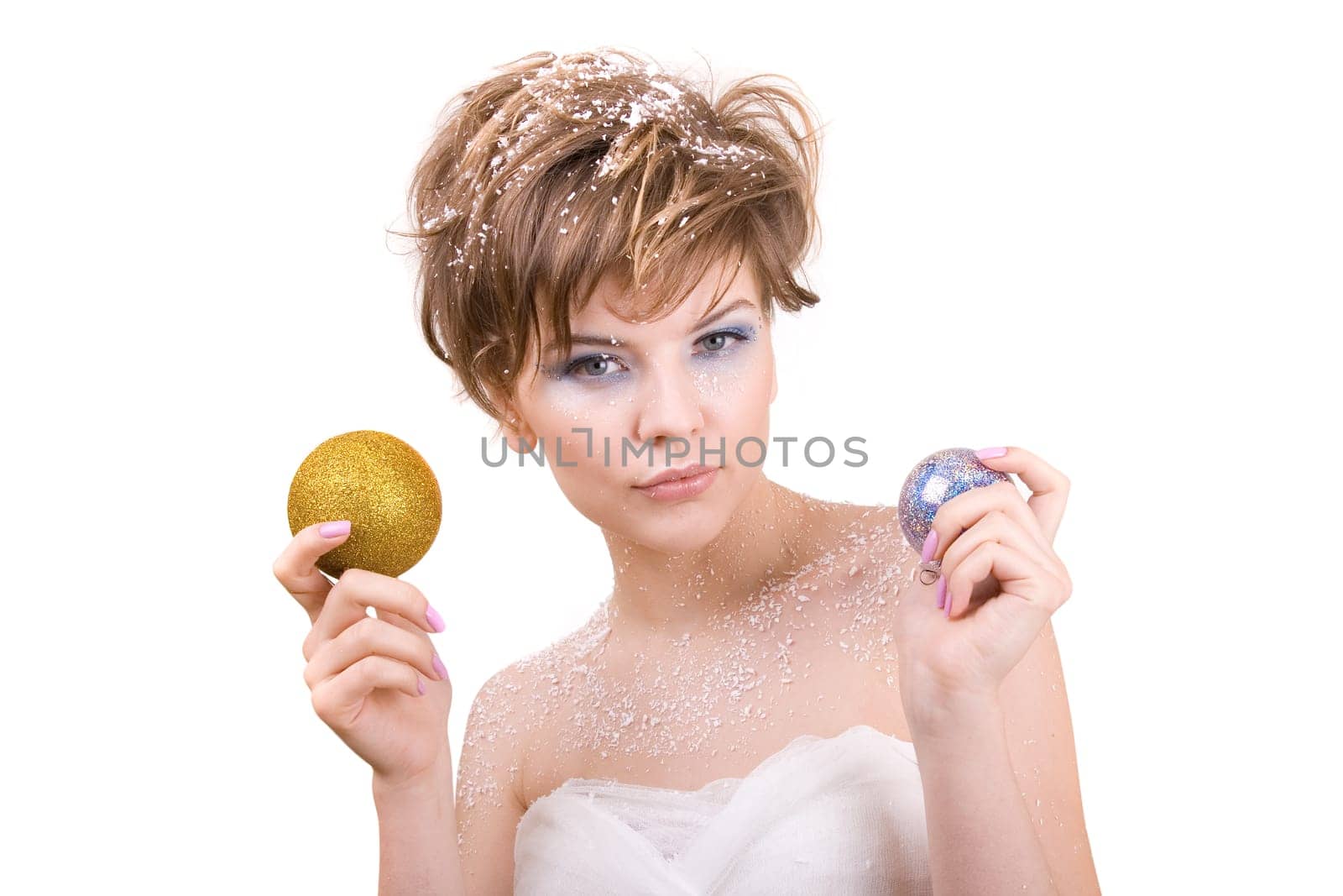 snow girl holding a christmas toy in her hand