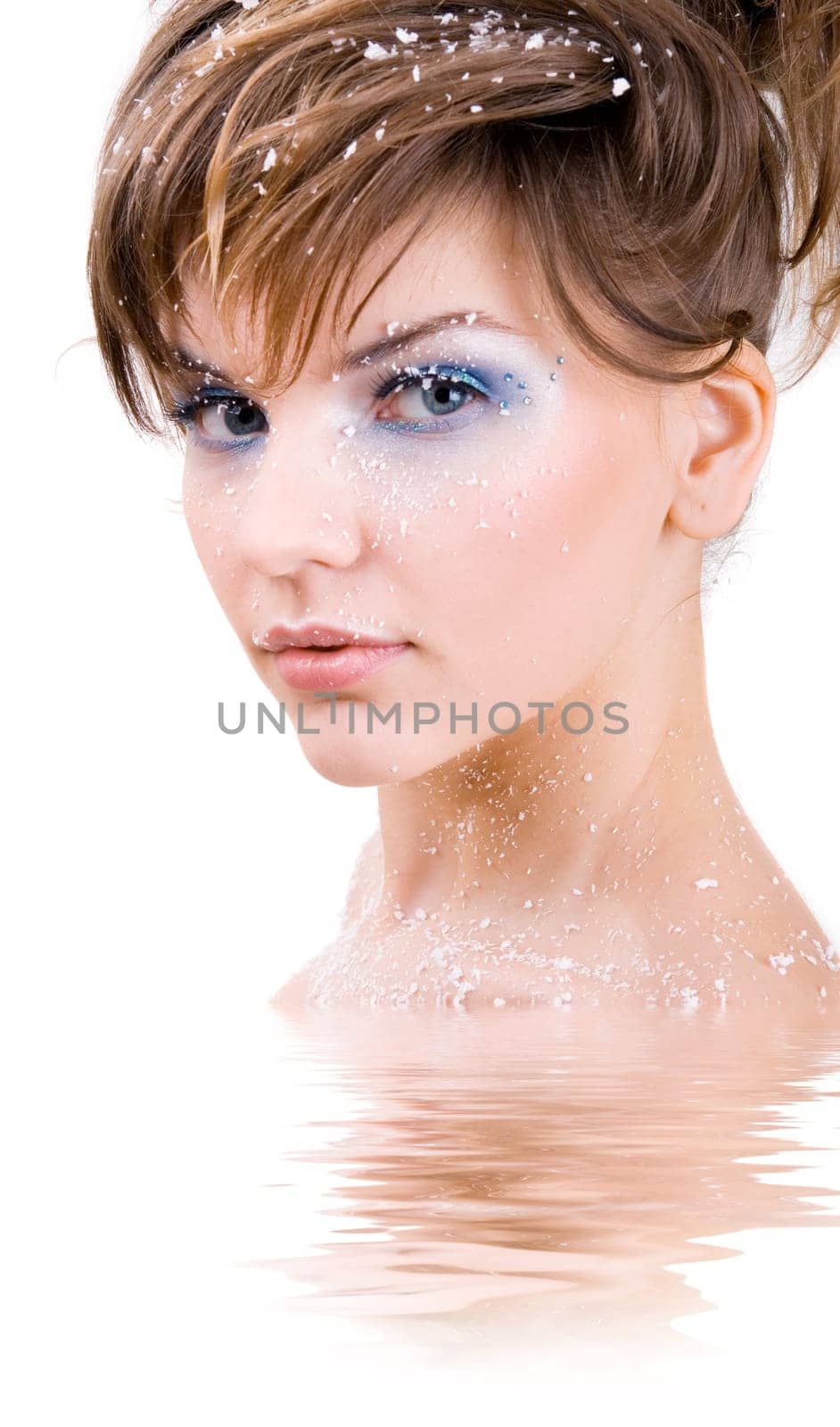 snow girl standing in the icy water