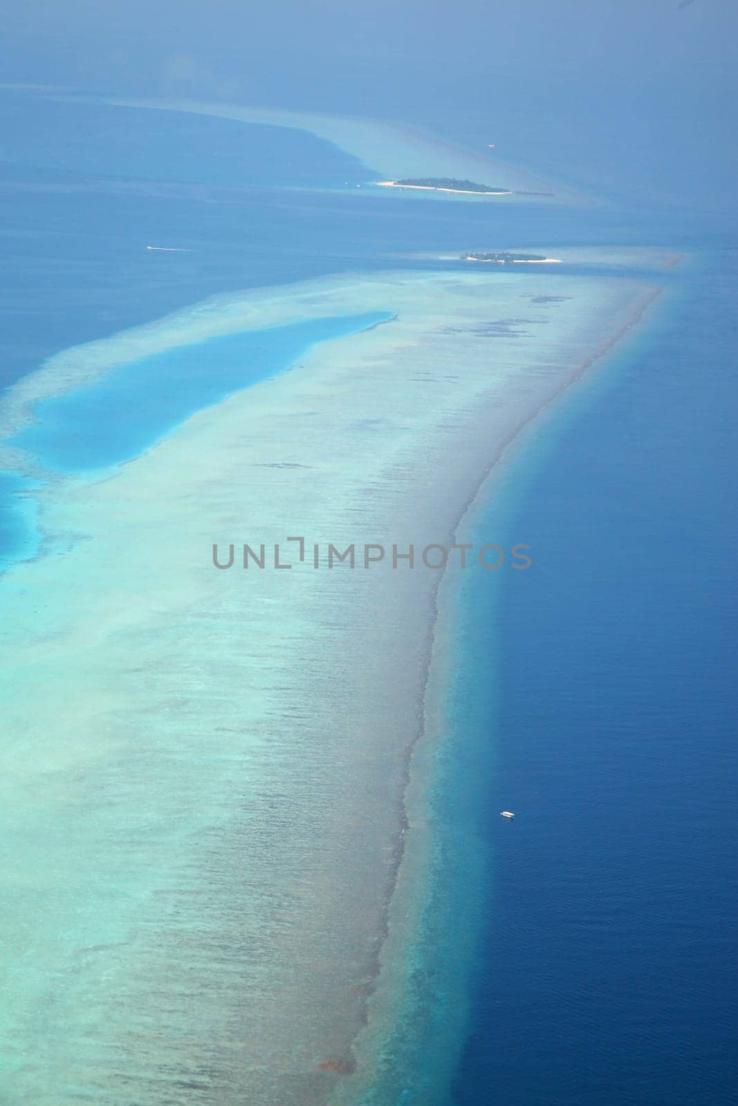 Paradise Maldives from the sky - aerial view of the lagoon