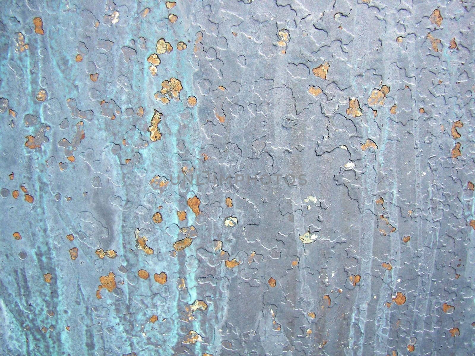 Paint chipped keel of a sailboat.