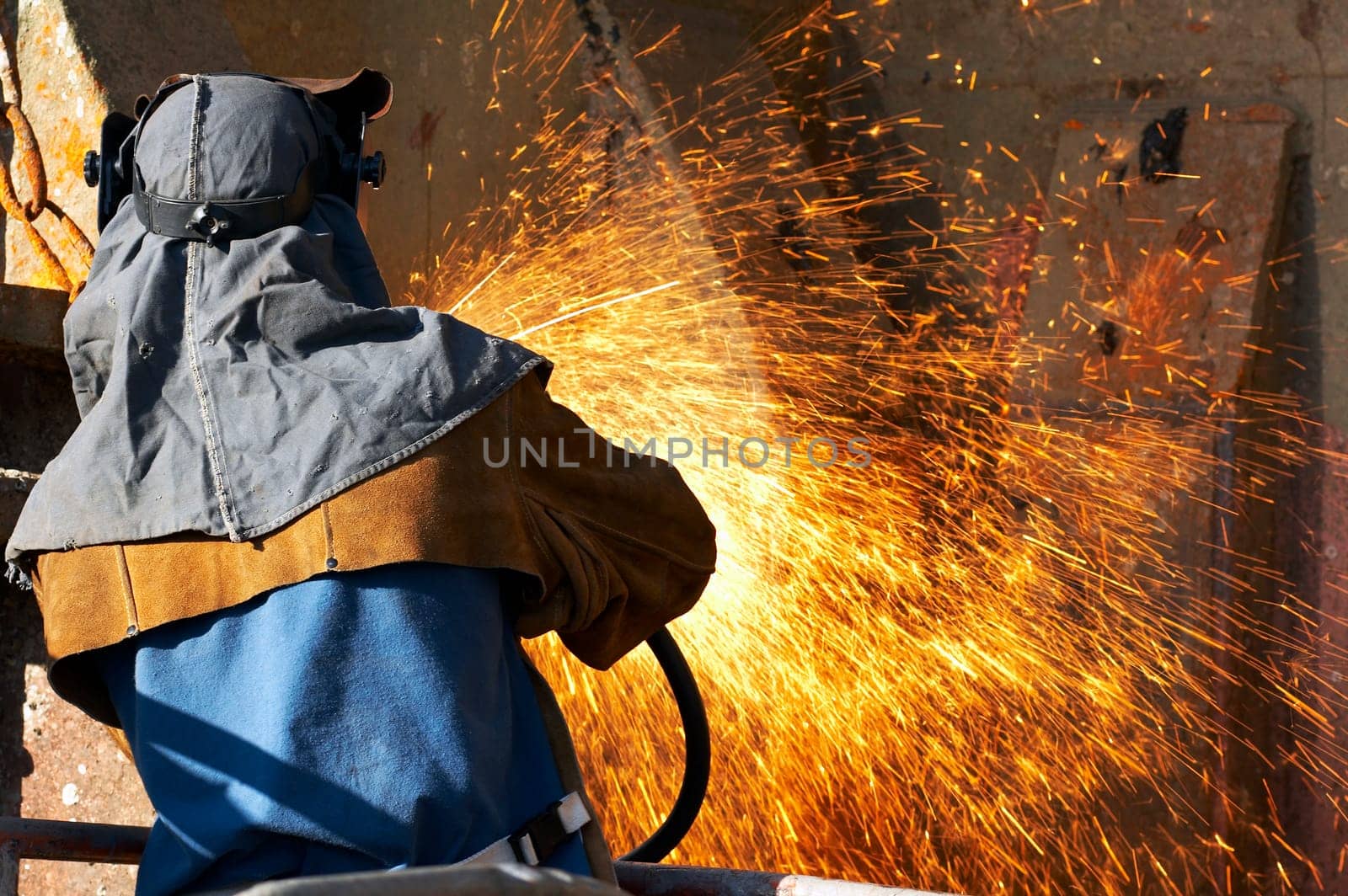 welder at shipyard working