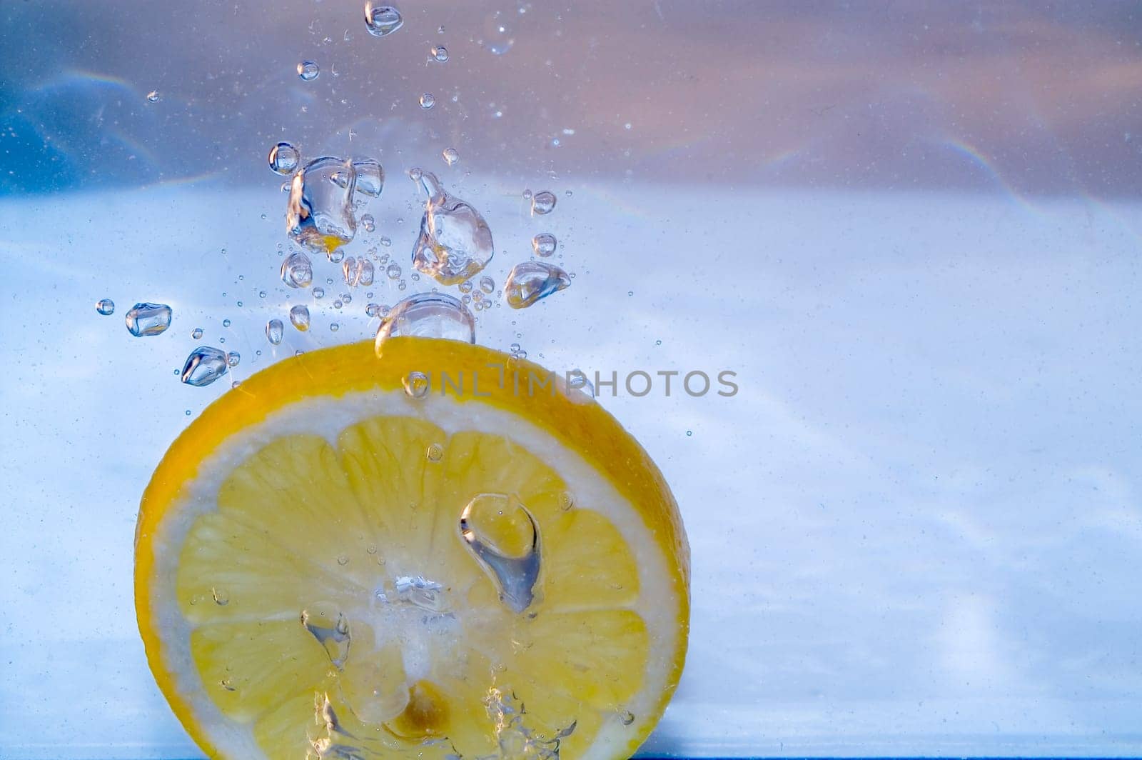 Slice of lemon splashing