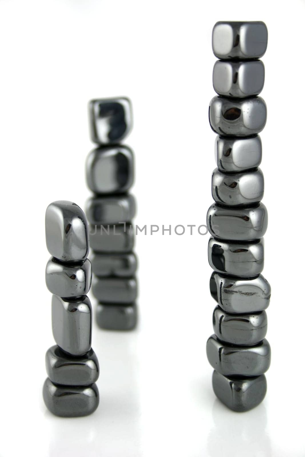A Balance of Primes - 3 Stacks of 5, 7 and 11 Stones in perfect balance