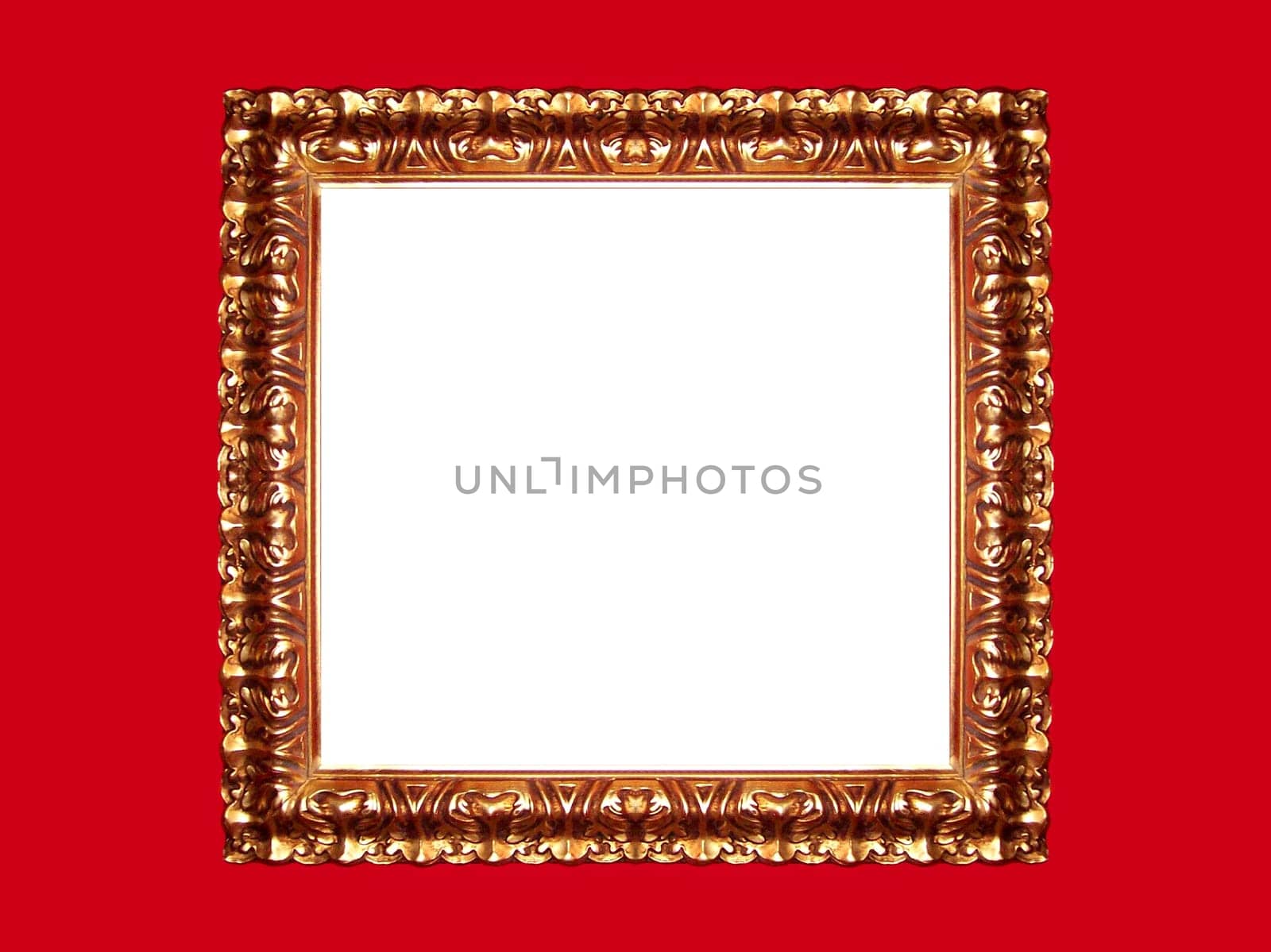 Cleaned up photo of a golden frame on a red background
