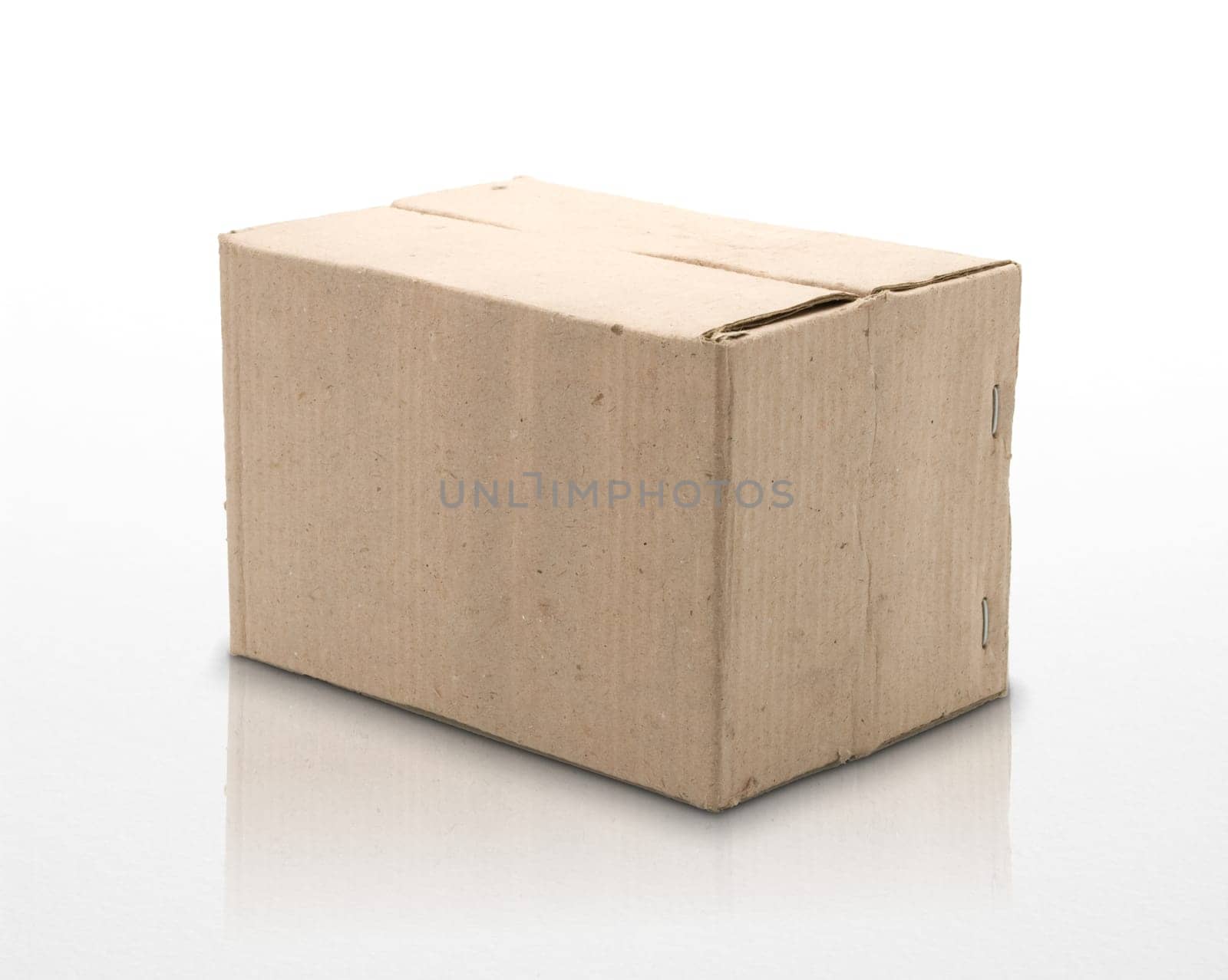 single old carton box, isolated on a white grey background