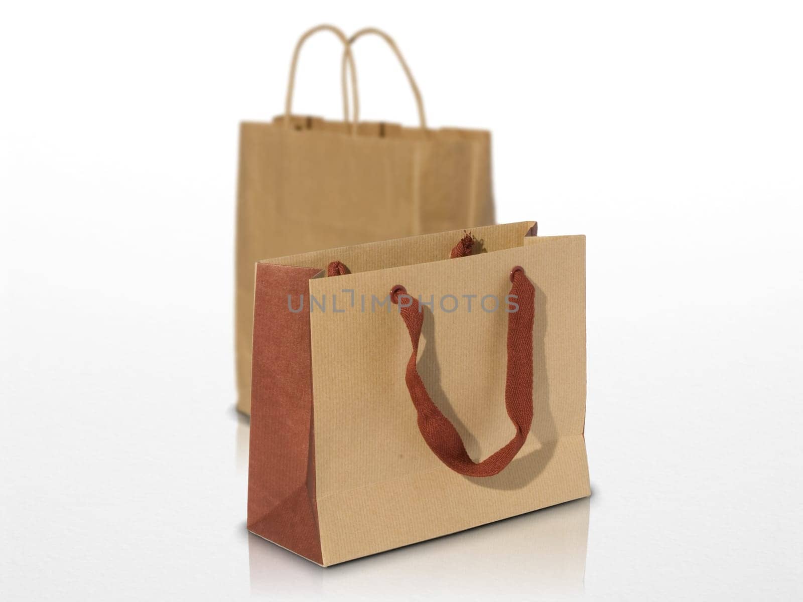 two ecological shopping bag on a white grey background one is blurred