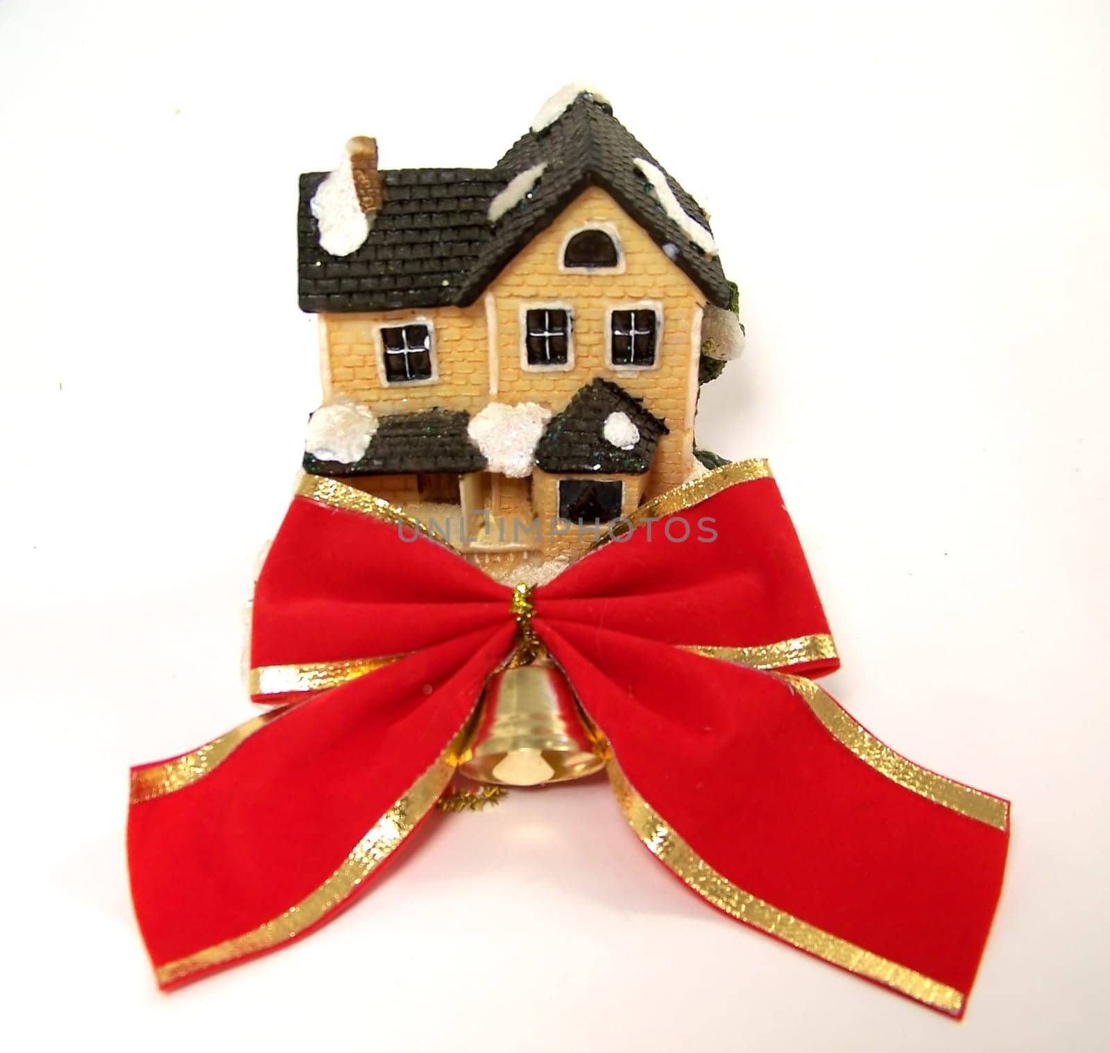Winter toy-house with red bow