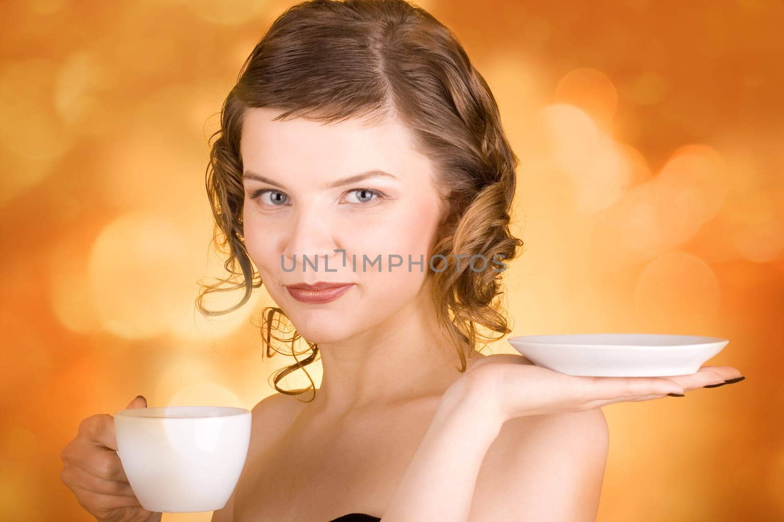 glamorous girl having a cup of coffee