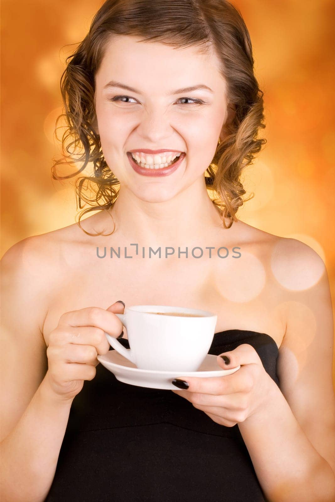 glamorous girl having a cup of coffee