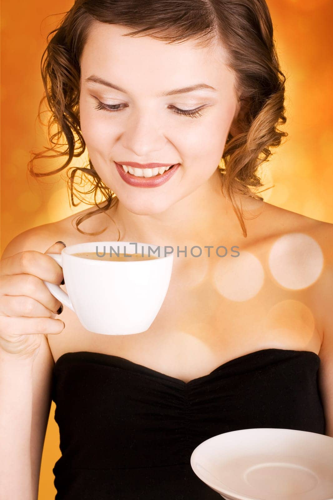 glamorous girl having a cup of coffee
