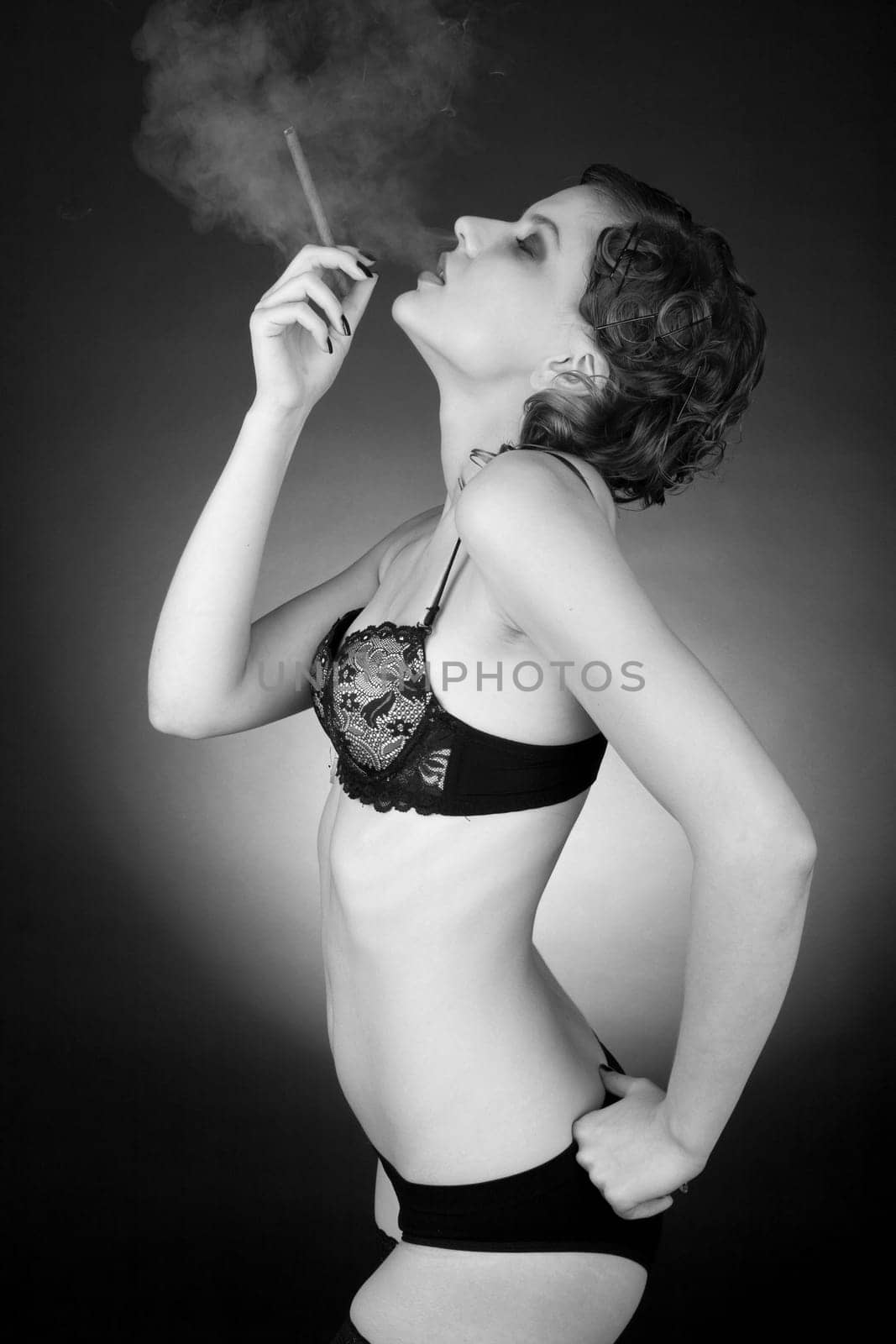 gorgeous girl with a smoking cigarette