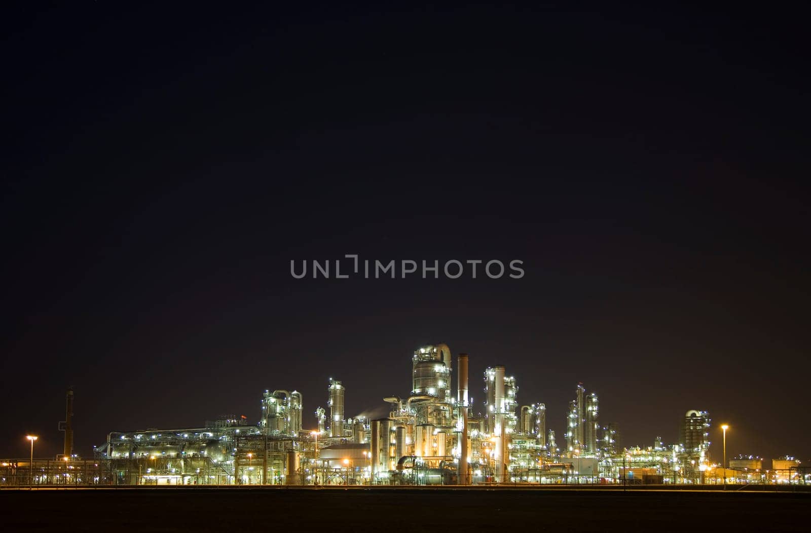 Refinery at night in the Port of Rotterdam, Europoort, Holland