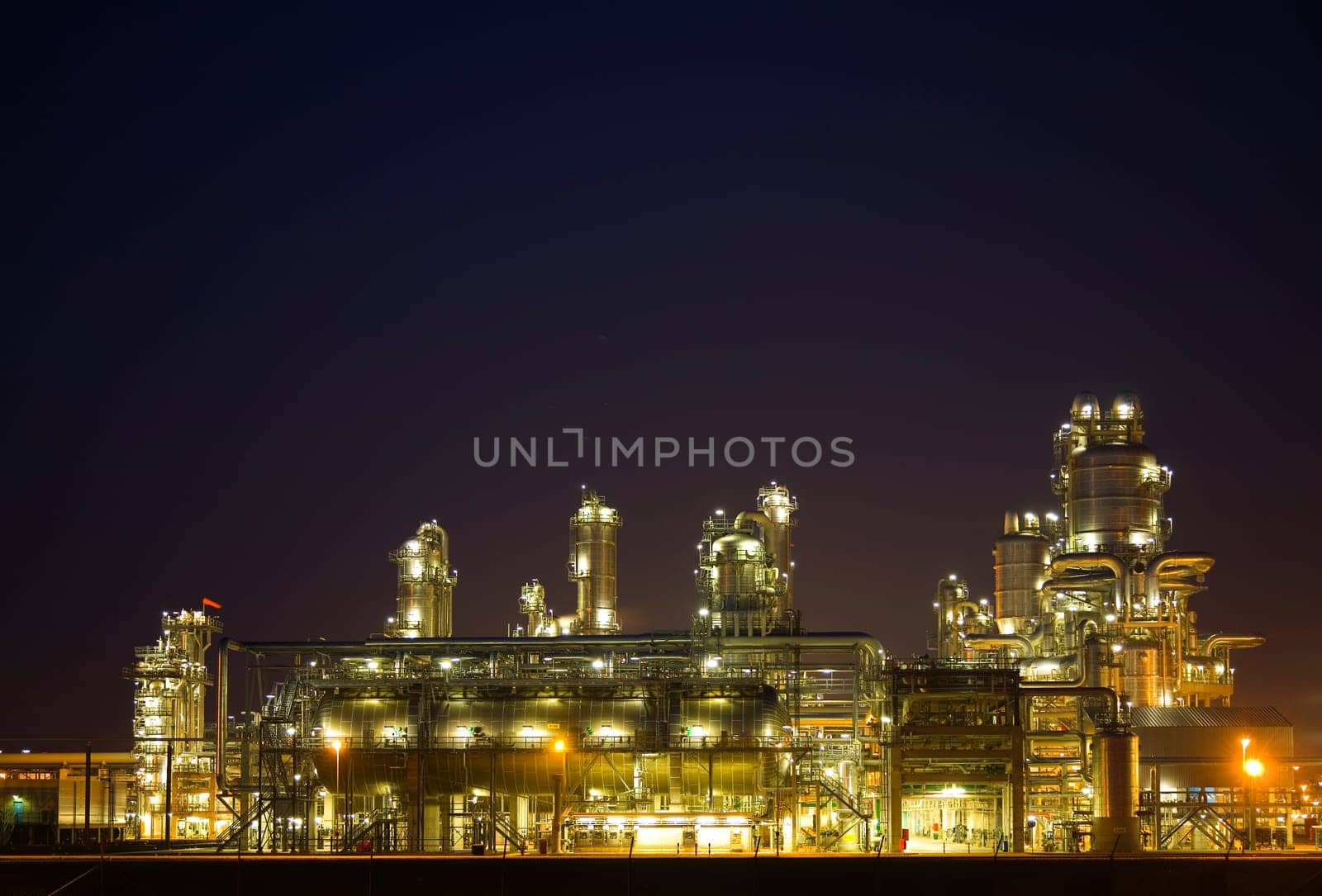 Refinery at night in the Port of Rotterdam, Europoort, Holland