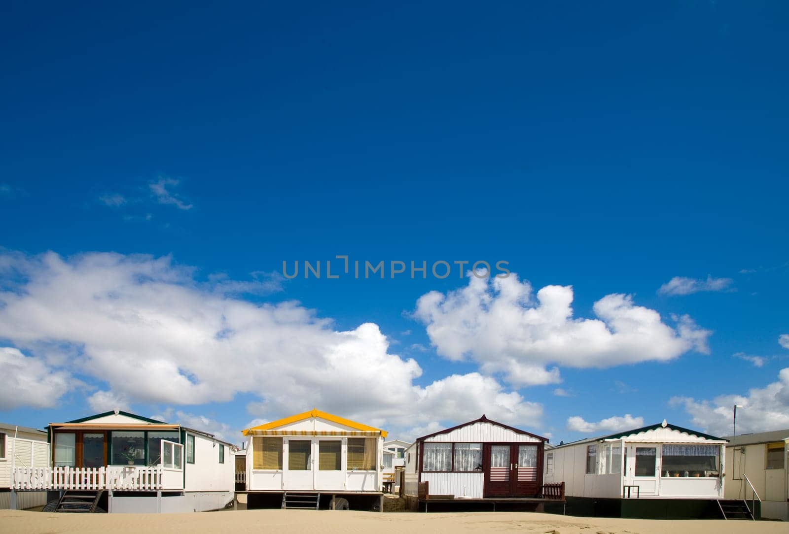 Beachs huts in a row by IJmuiden, the Netherlands