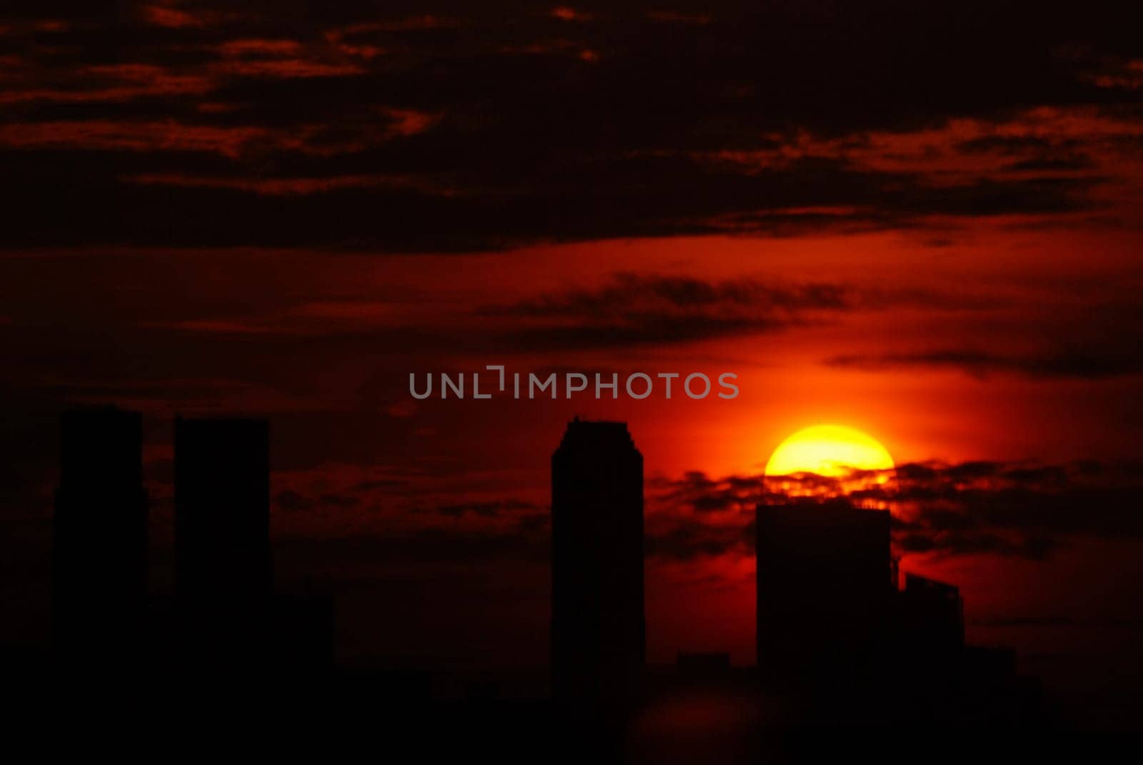 sunrise, cloud and modern building in the parks