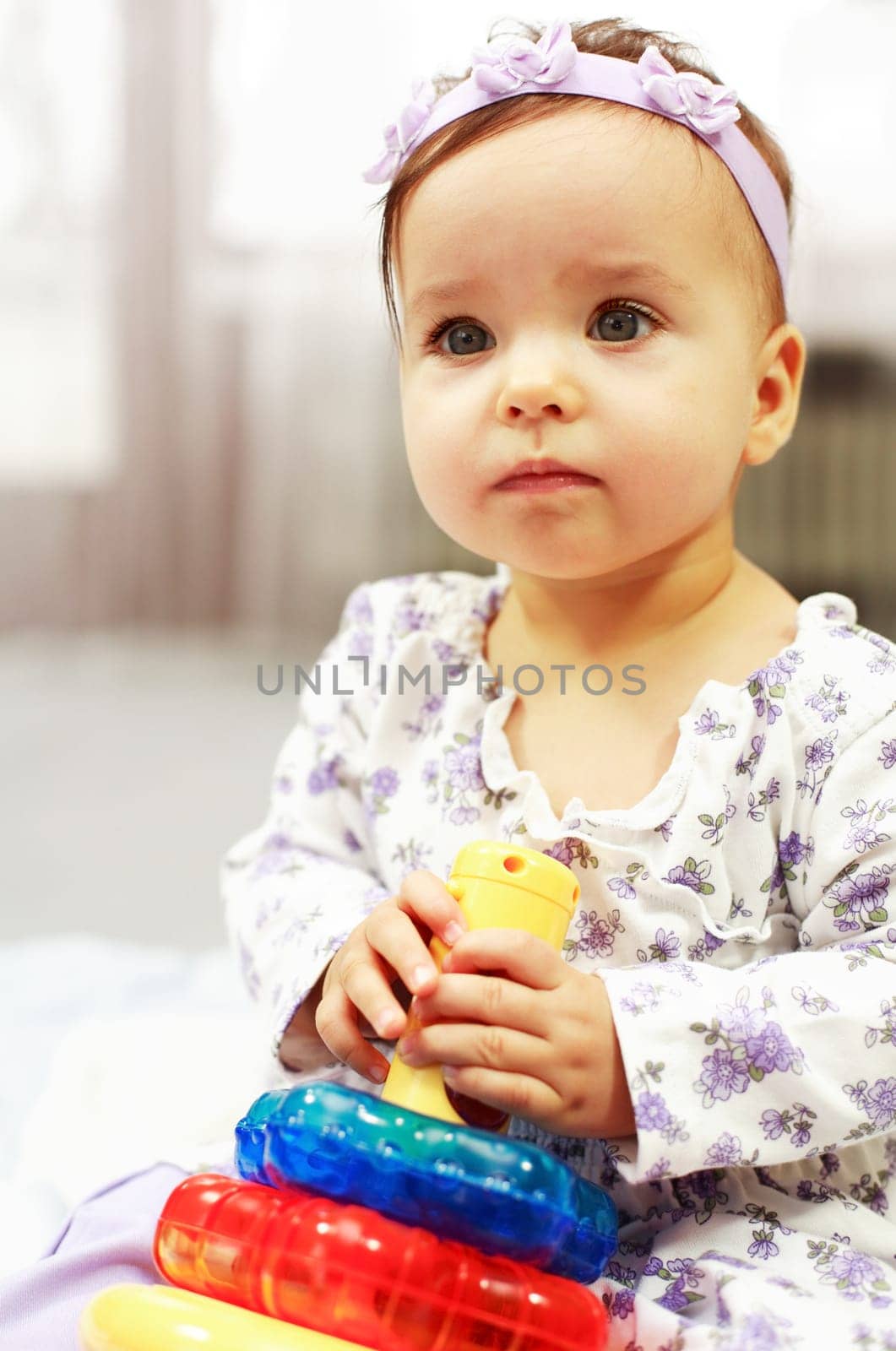Baby plays with toys