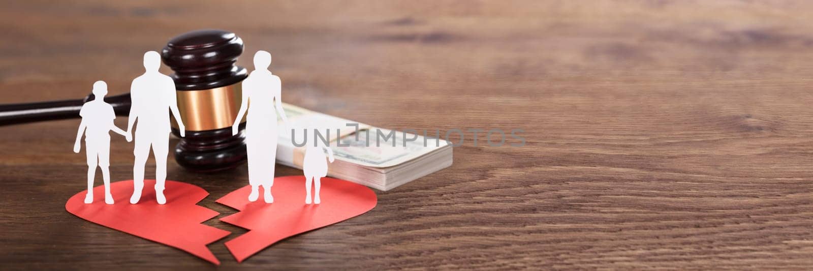 Gavel And Paper Family Representing Divorce On Wooden Desk