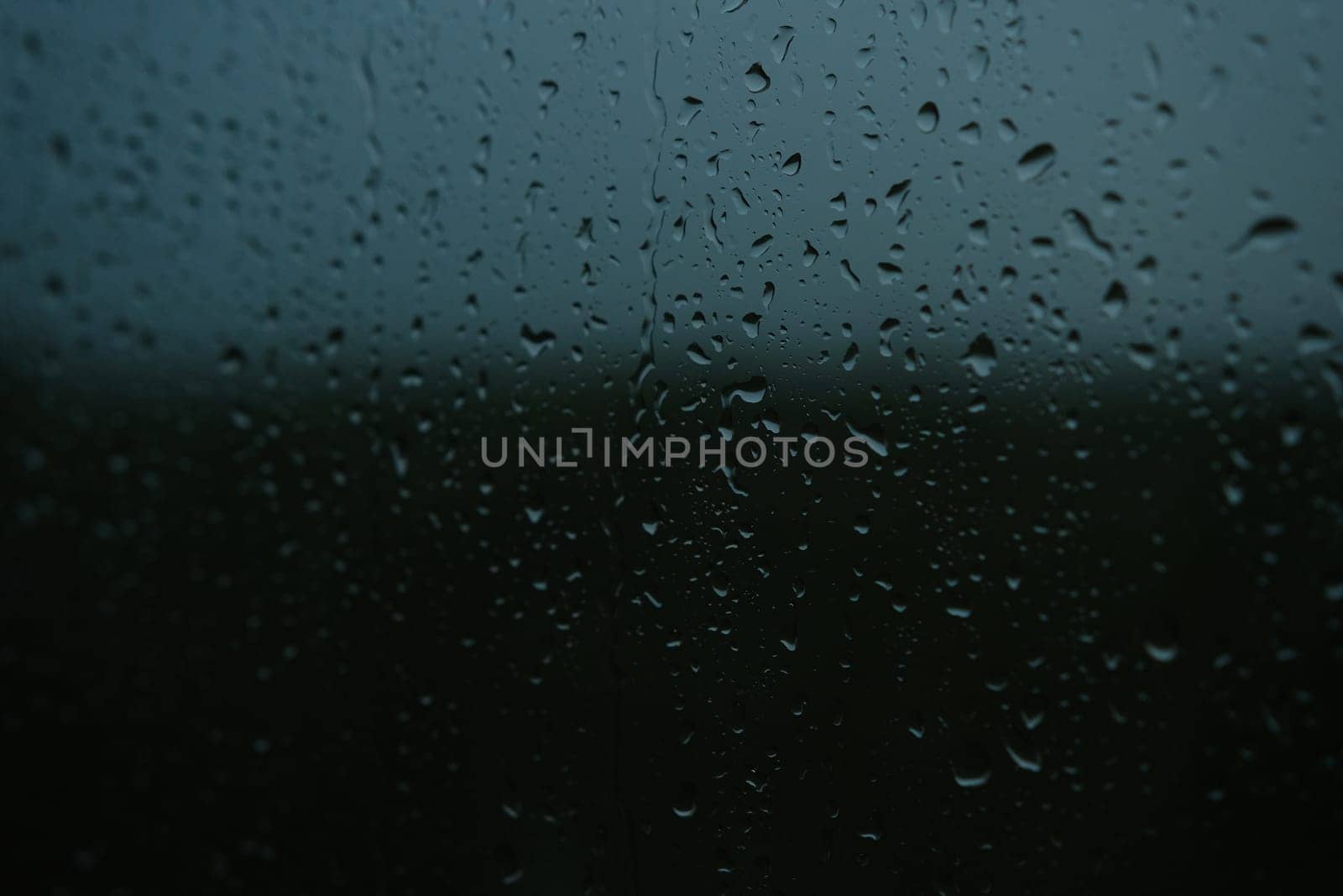 Water drops on the glass - abstract background, Shades of Gray.