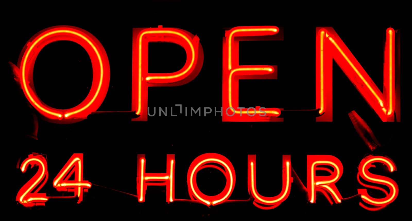 Open 24 Hours neon sign on black background