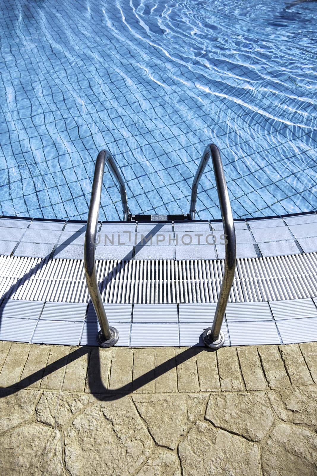 Detail of access to an outdoor swimming pool, sports and holidays