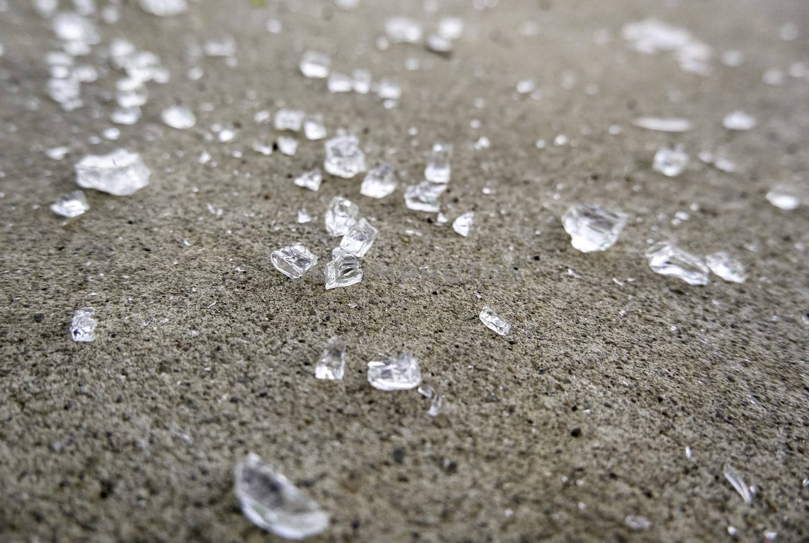 Detail of broken glass in the garbage, danger due to cuts