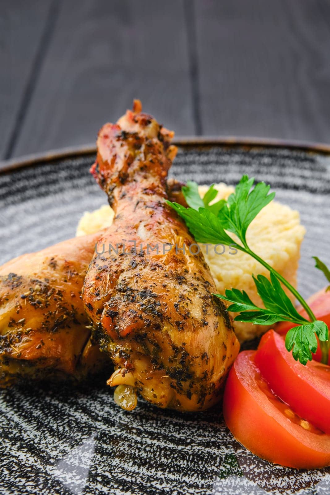 Close up view of fried chicken leg with millet porridge