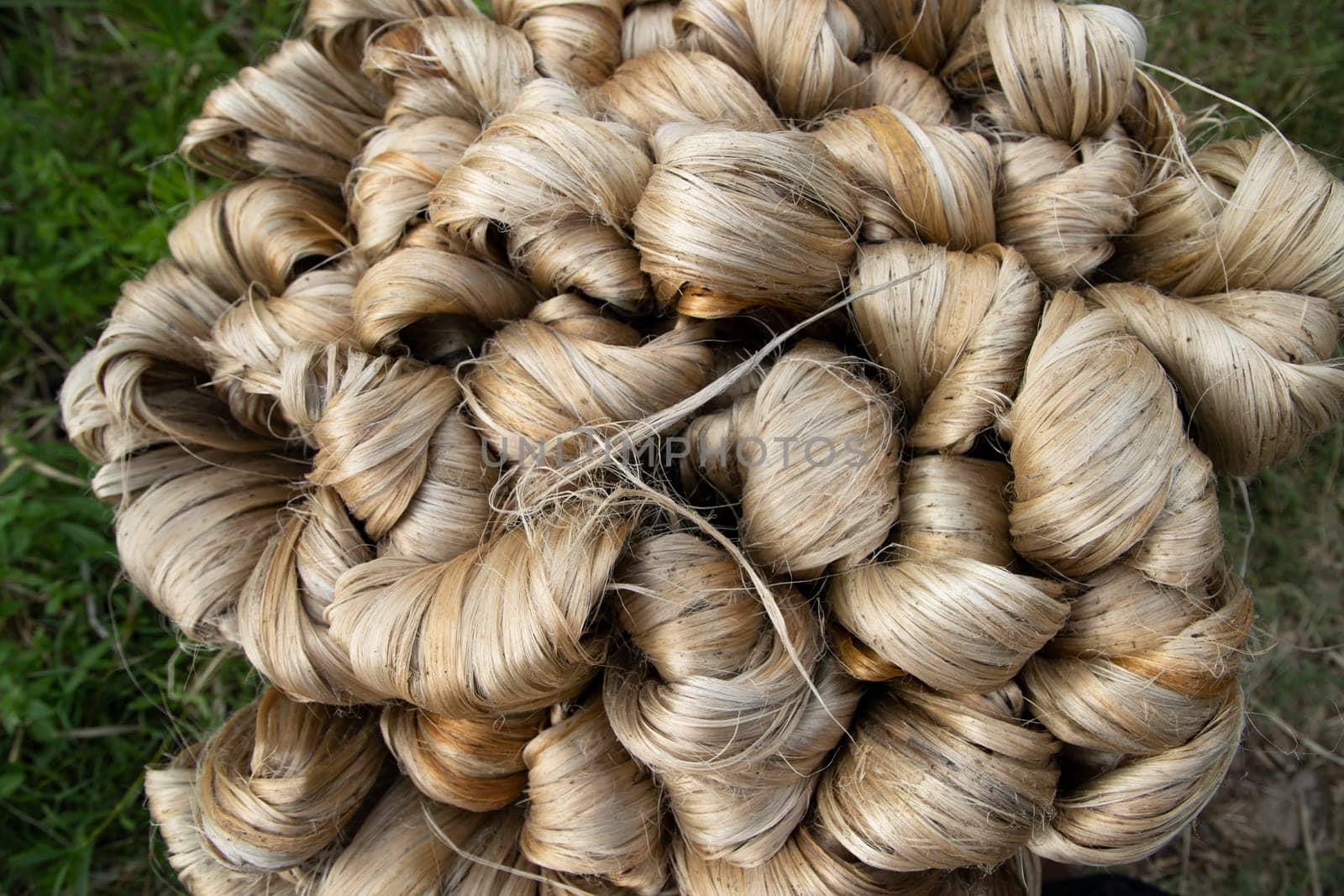 thick brown bundle of raw jute fiber Texture Background.  Golden Fiber Texture background