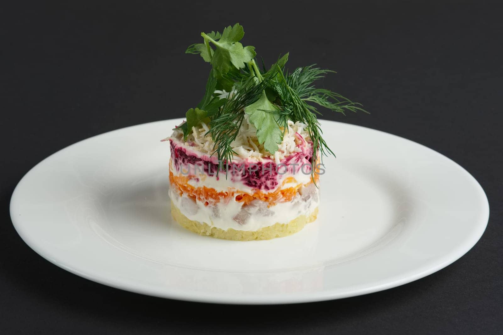 salad herring with beetroot, potato and mayonnaise