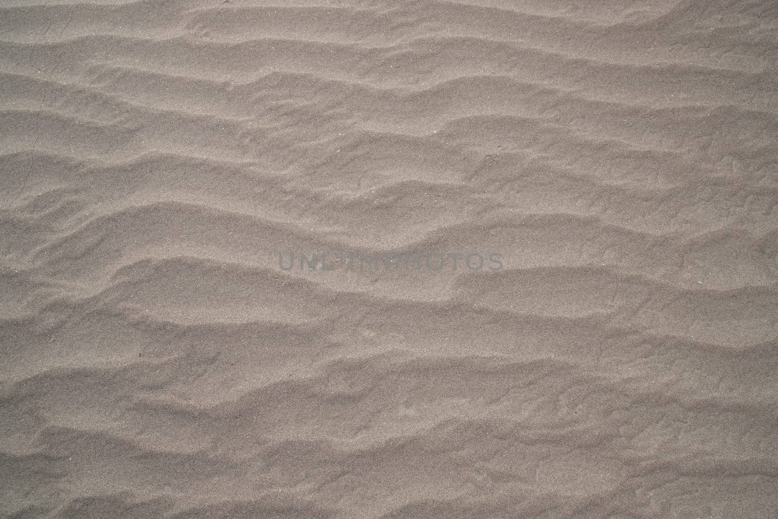 sand texture. wavy sand textured background. sand textured beach