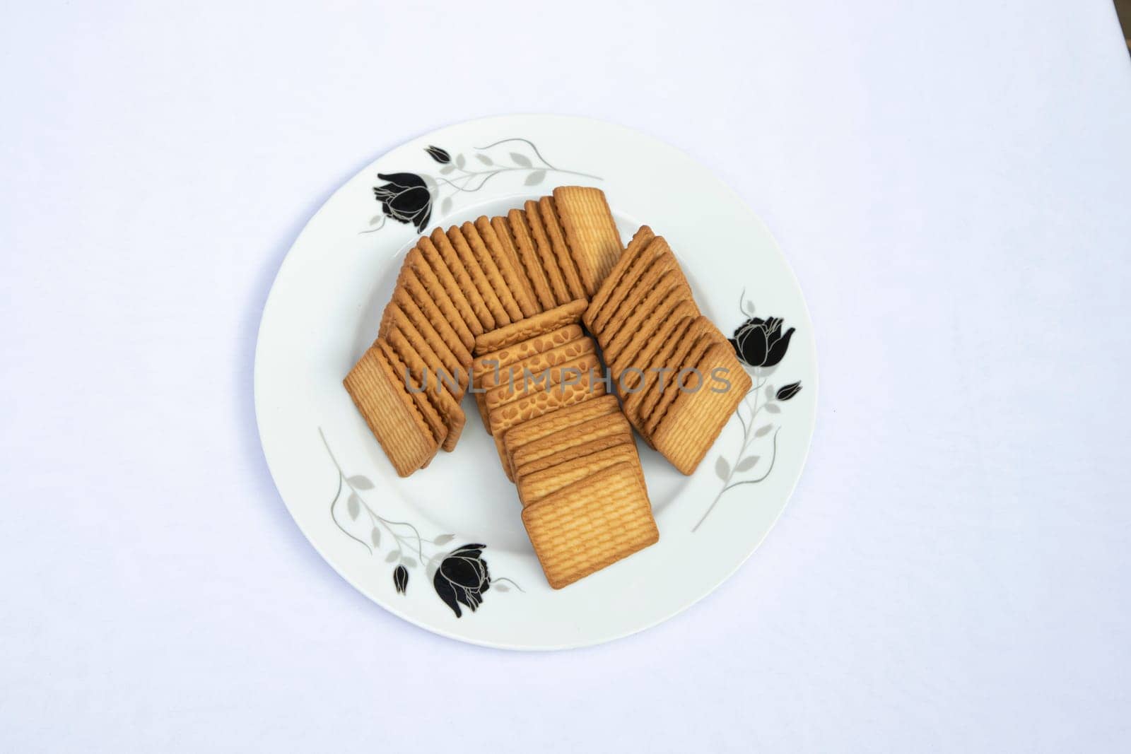 Top View Brown-wheat Biscuits in the Plate isolated Background