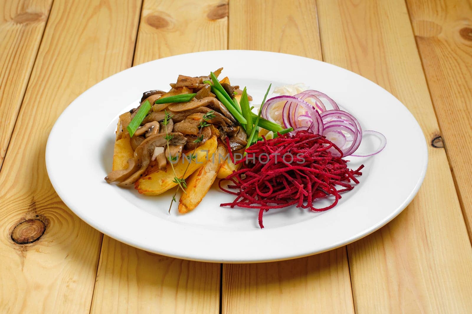 Fried potato, beetroot, pickled cabbage and mushrooms