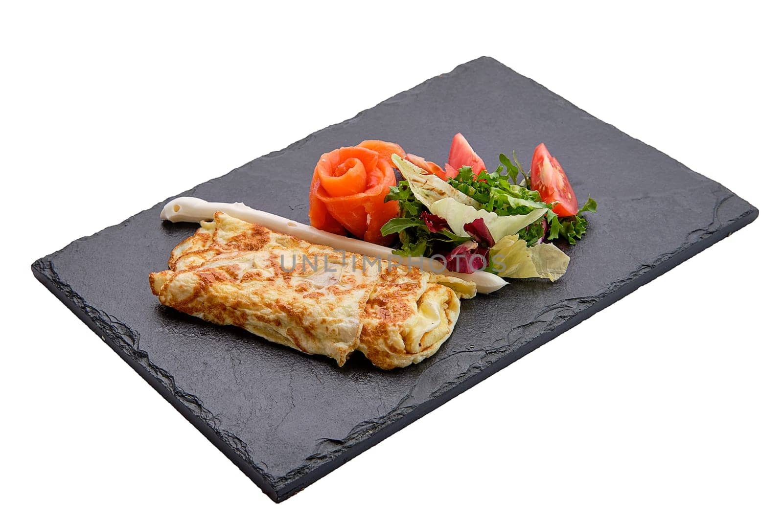 Omelette with salmon isolated on white