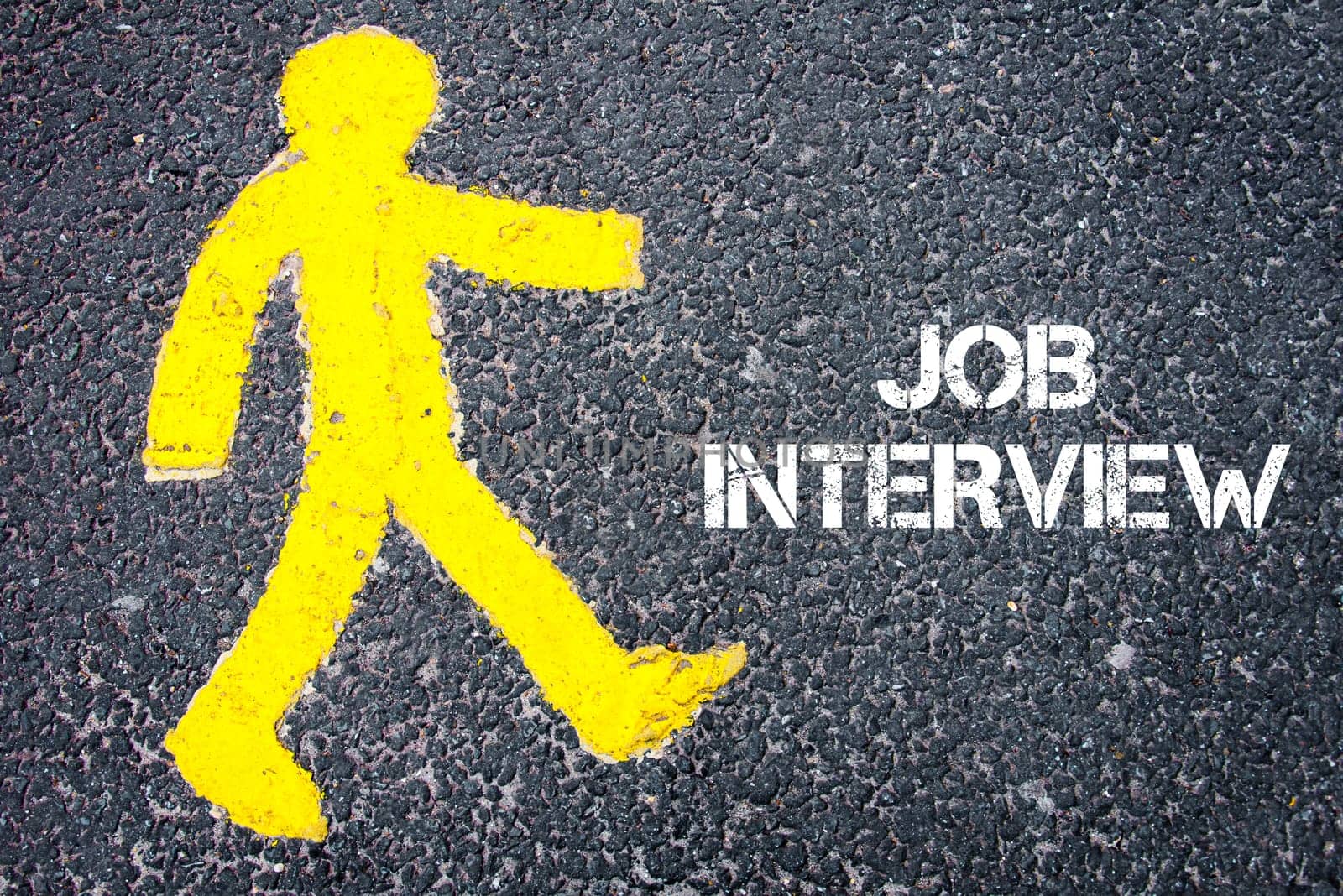 Yellow pedestrian figure on the road walking towards JOB INTERVIEW. Conceptual image with Text message over asphalt background.