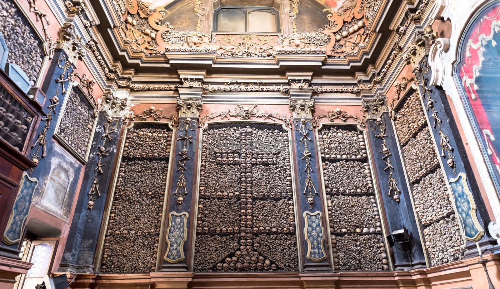Milan, Italy - Circa August 2020. Ossuary Chapel in San Bernardino alle Ossa Church. Every architectural detail is clad in human bones.