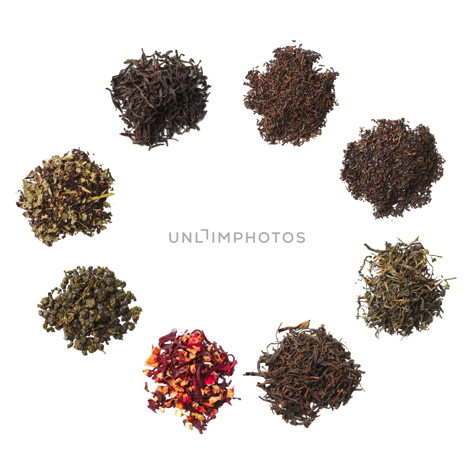 Heap of dried herbal tea leaves isolated on white. Top view.