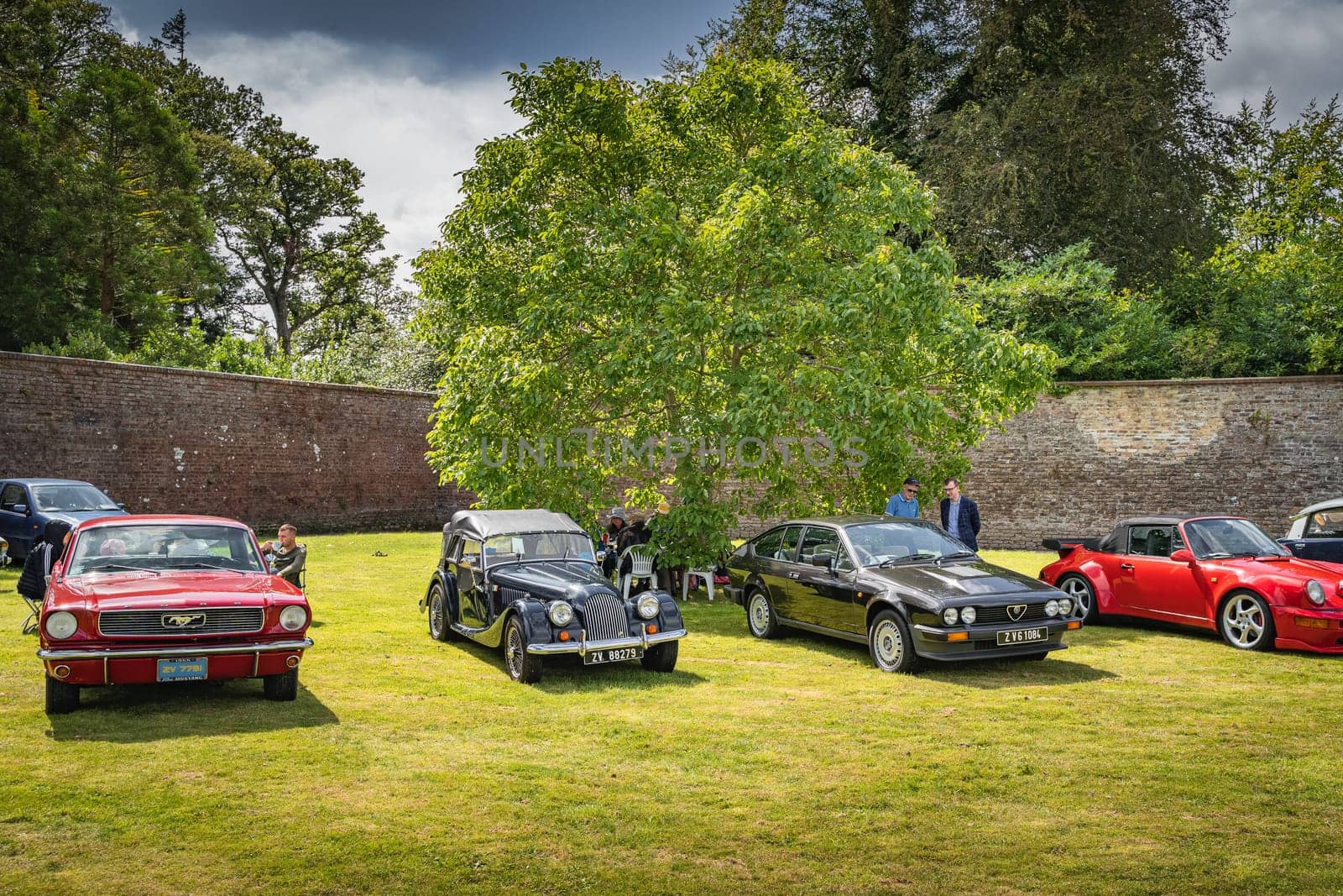 Wicklow, Ireland, August 2019 Irish Veteran and Vintage Car Club in Powerscourt, people admiring beautiful vintage cars
