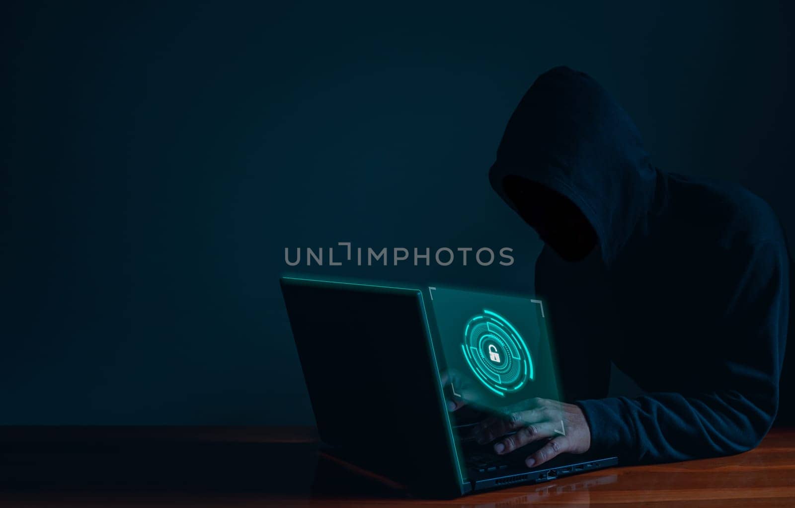Hackers work on laptops in the dark. The concept of information security in the Internet network and information espionage.