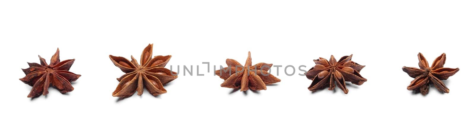 Star shape cinnamon in a row on white background