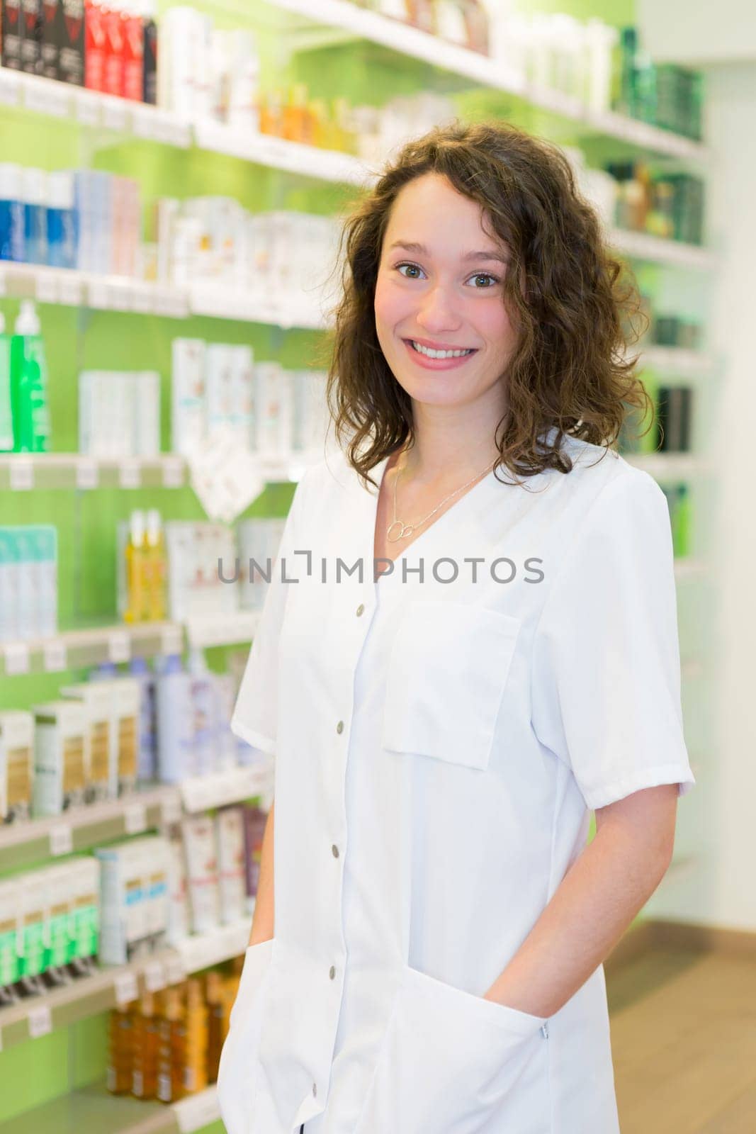 View of an attractive pharmacist at work