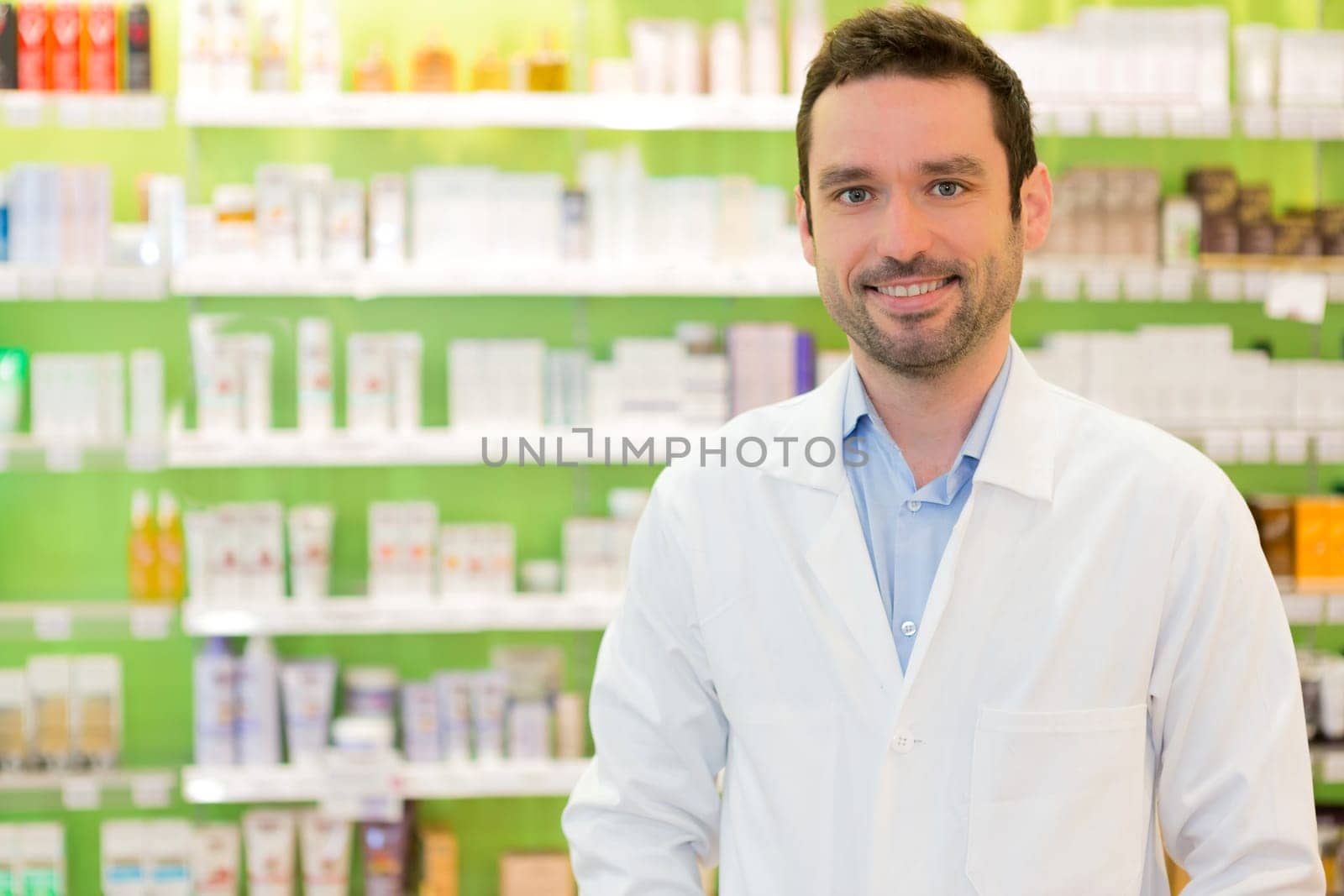 View of an attractive pharmacist at work