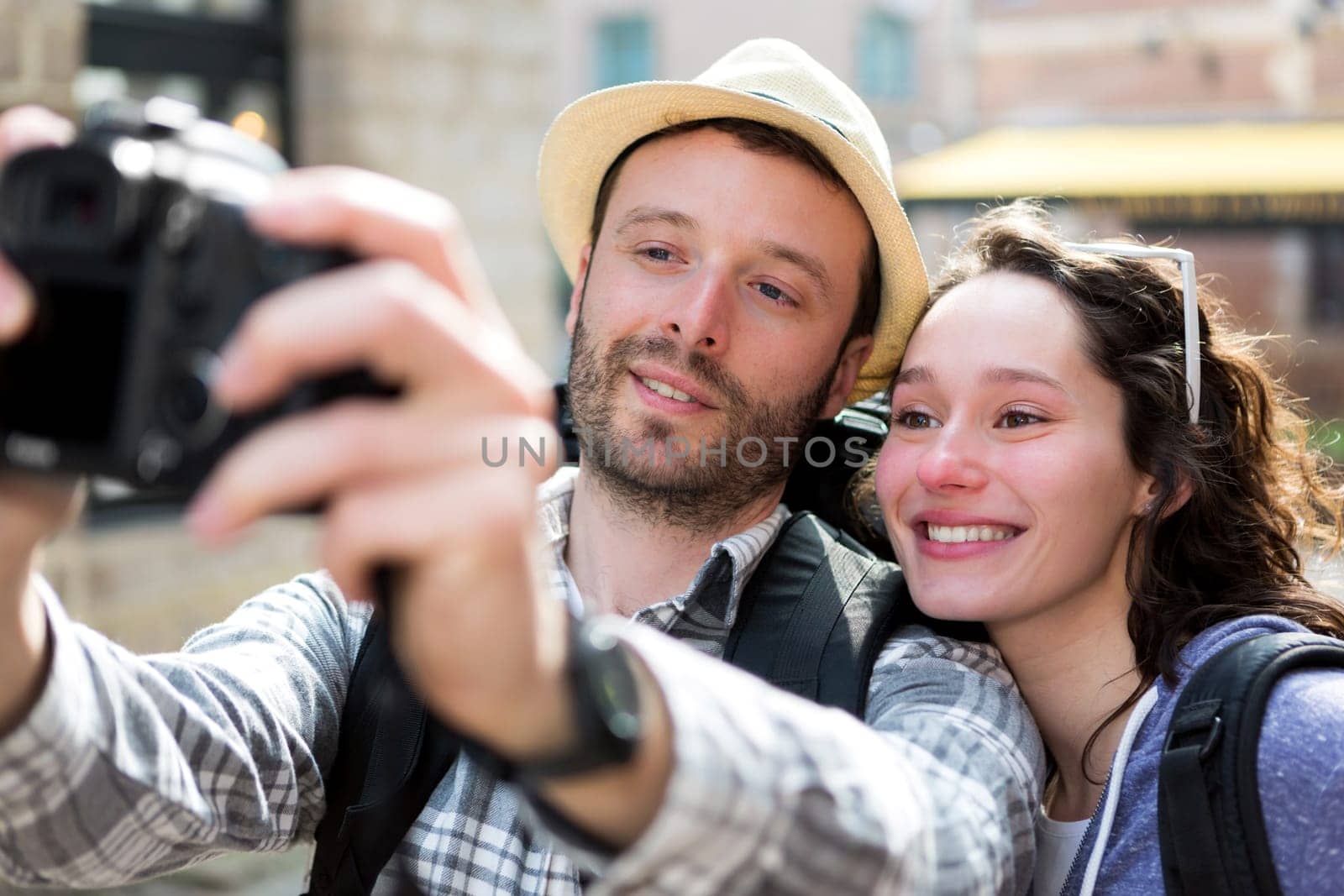 View of a Young couple on holidays taking selfie