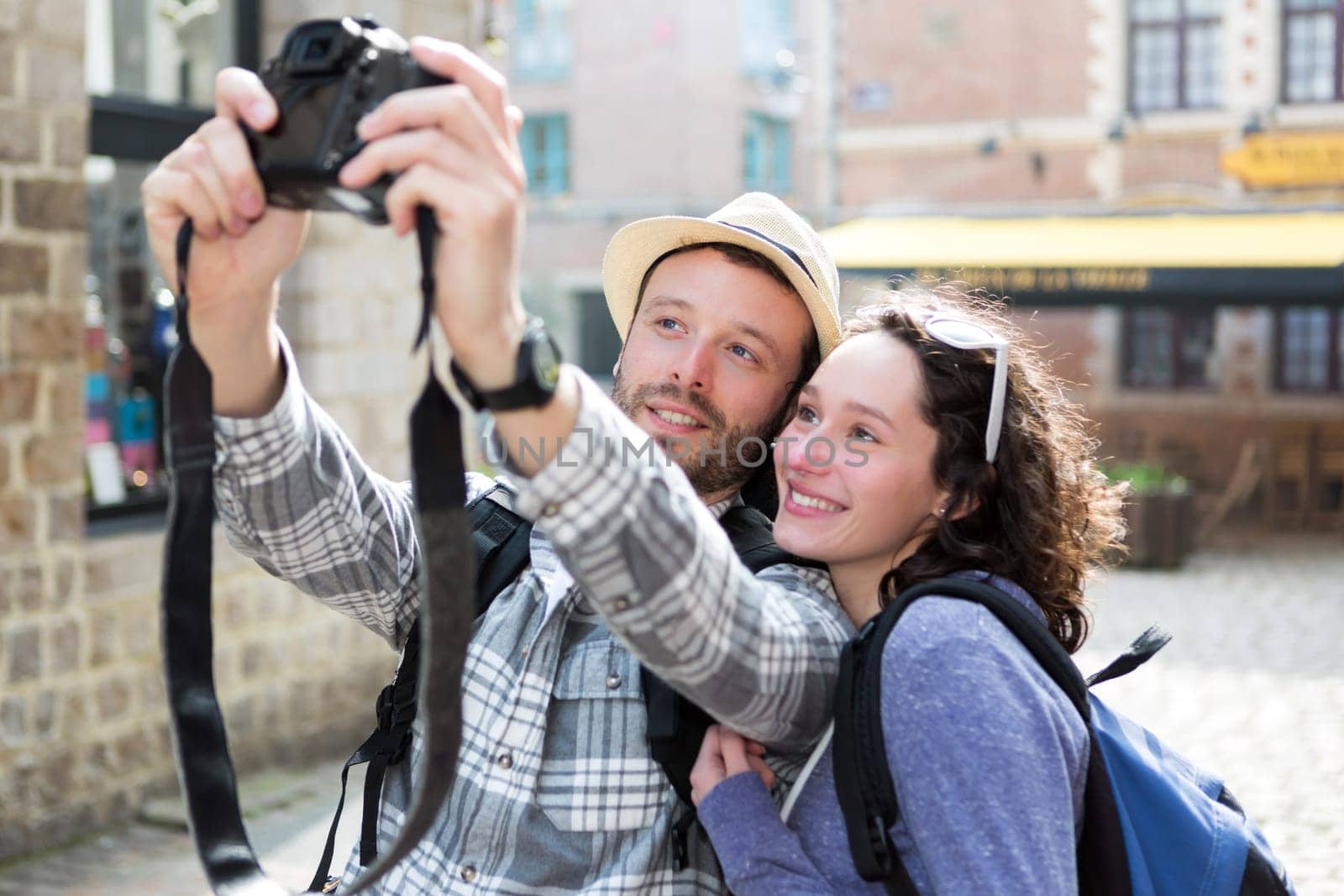 View of a Young couple on holidays taking selfie