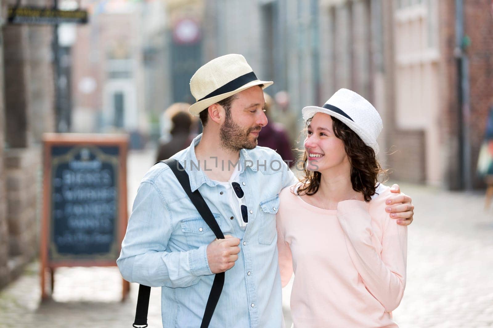 View of a Young couple visiting city during holidays