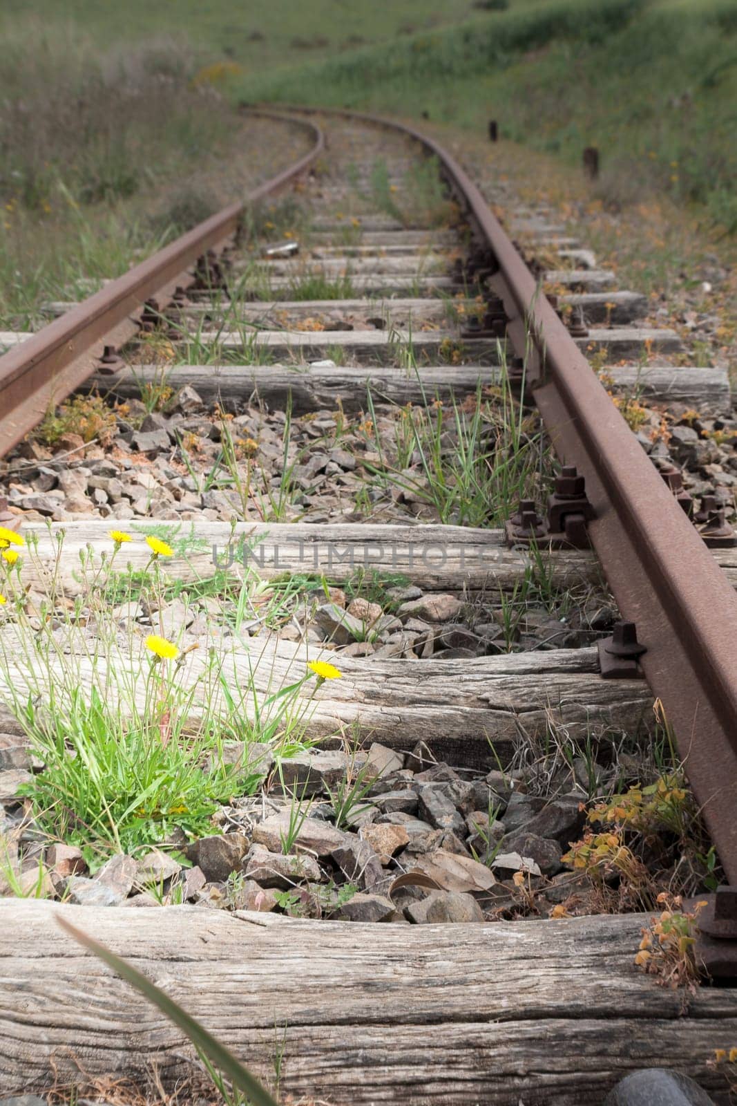 Old Wood Tie iron. Old railroad in the country