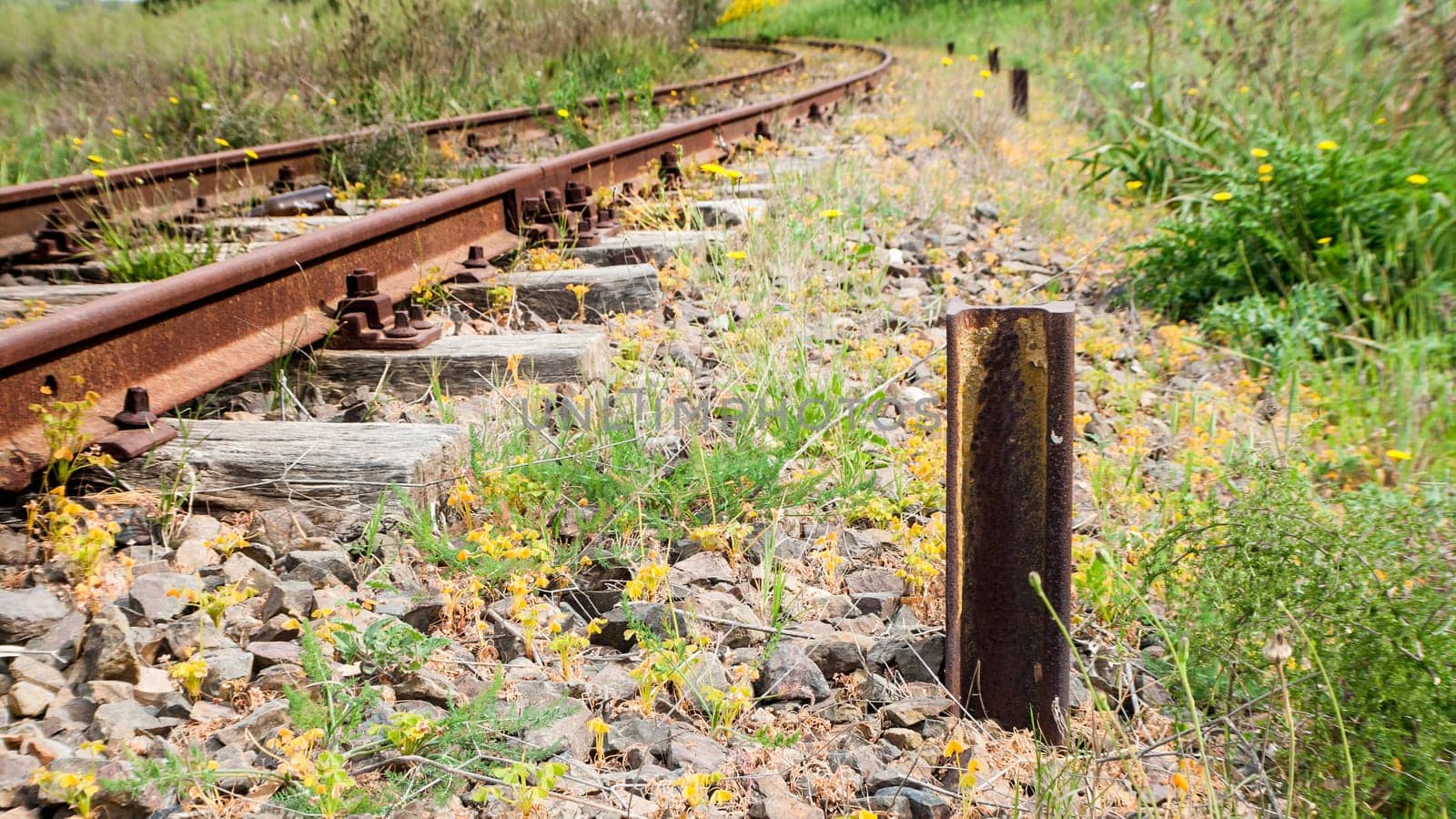 Old Wood Tie iron. Old railroad in the country